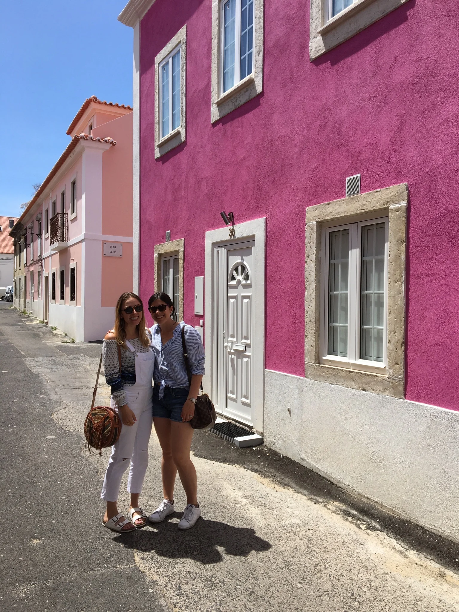 Find this gorgeous pink house right across the street from the bridge by Torre de Belém.