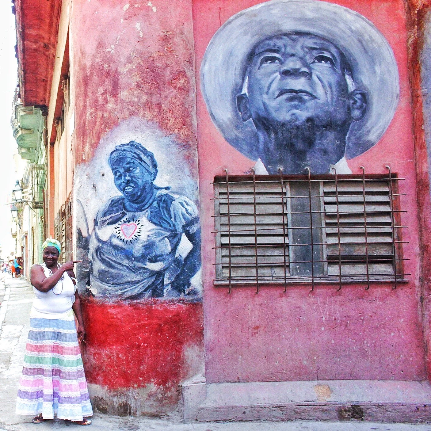This woman told me to take a picture of her with her street portrait. After, she told me to pay her 1 CUC. Hey, it's a pretty cool pic! 