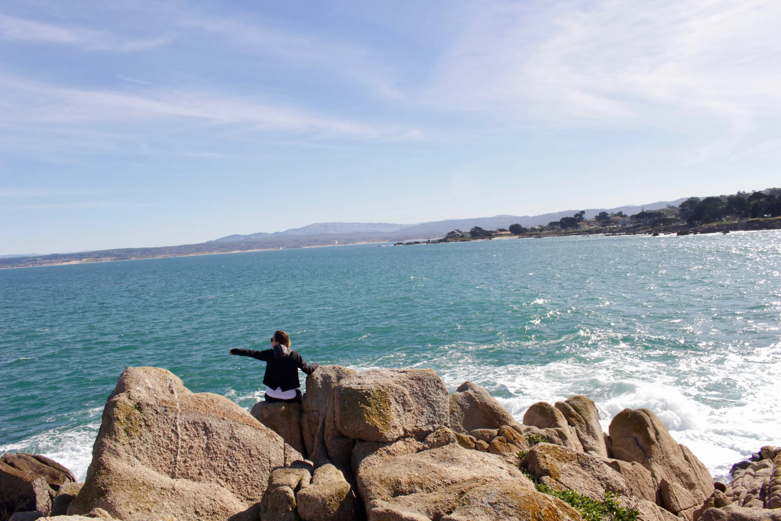 Climbing the rocks and spotting sea otters at Lovers Point Park.