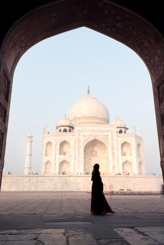 After taking pictures by the reflection pool, head to the wall at the right of the Taj Mahal for the view of the sunrise.