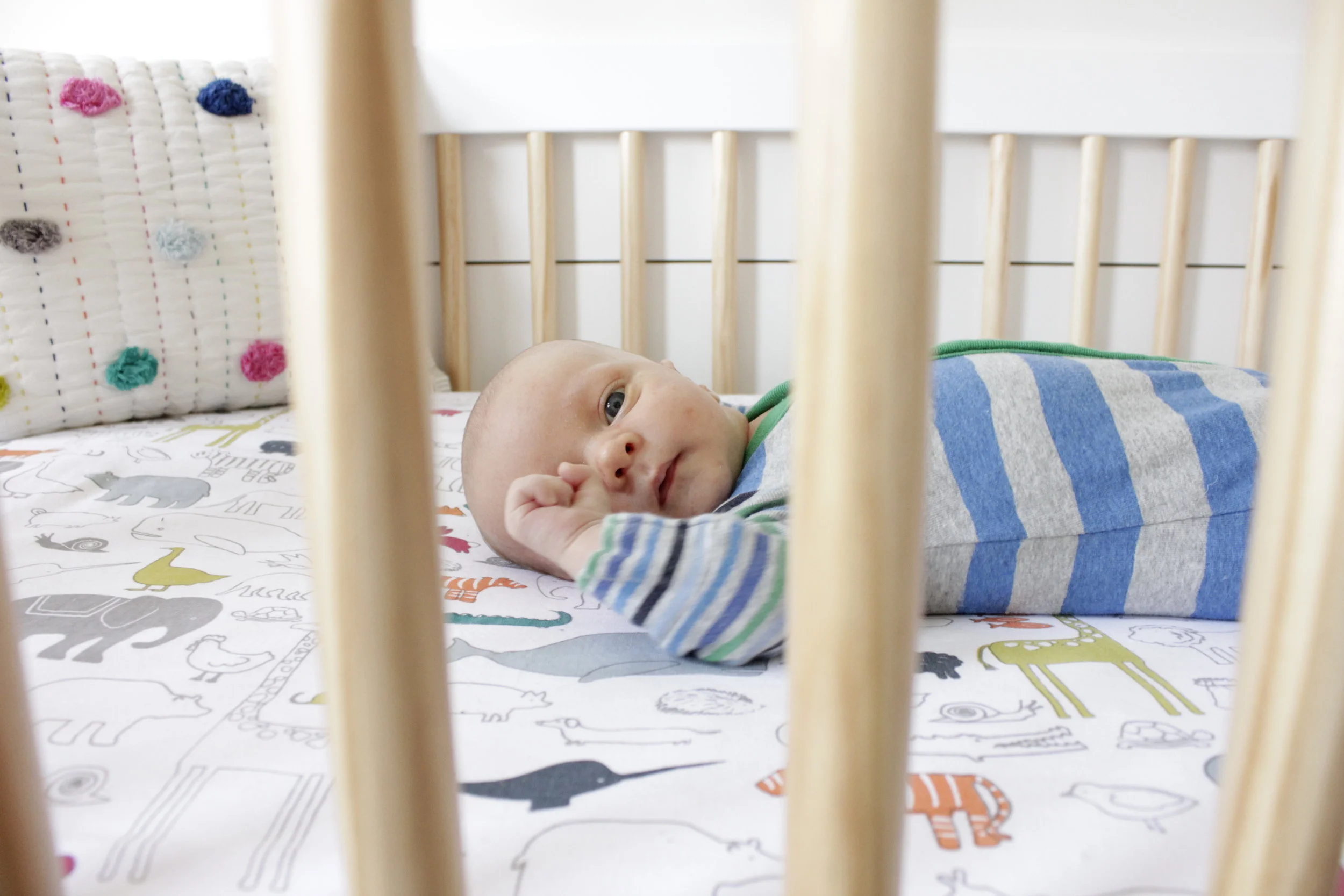 Jack at one month! At this one month check up, he weighed 10 lbs 6 oz. This week he also started going through a mental growth spurt + started to lift + turn his head + to make eye contact with Mama + Daddy. 
