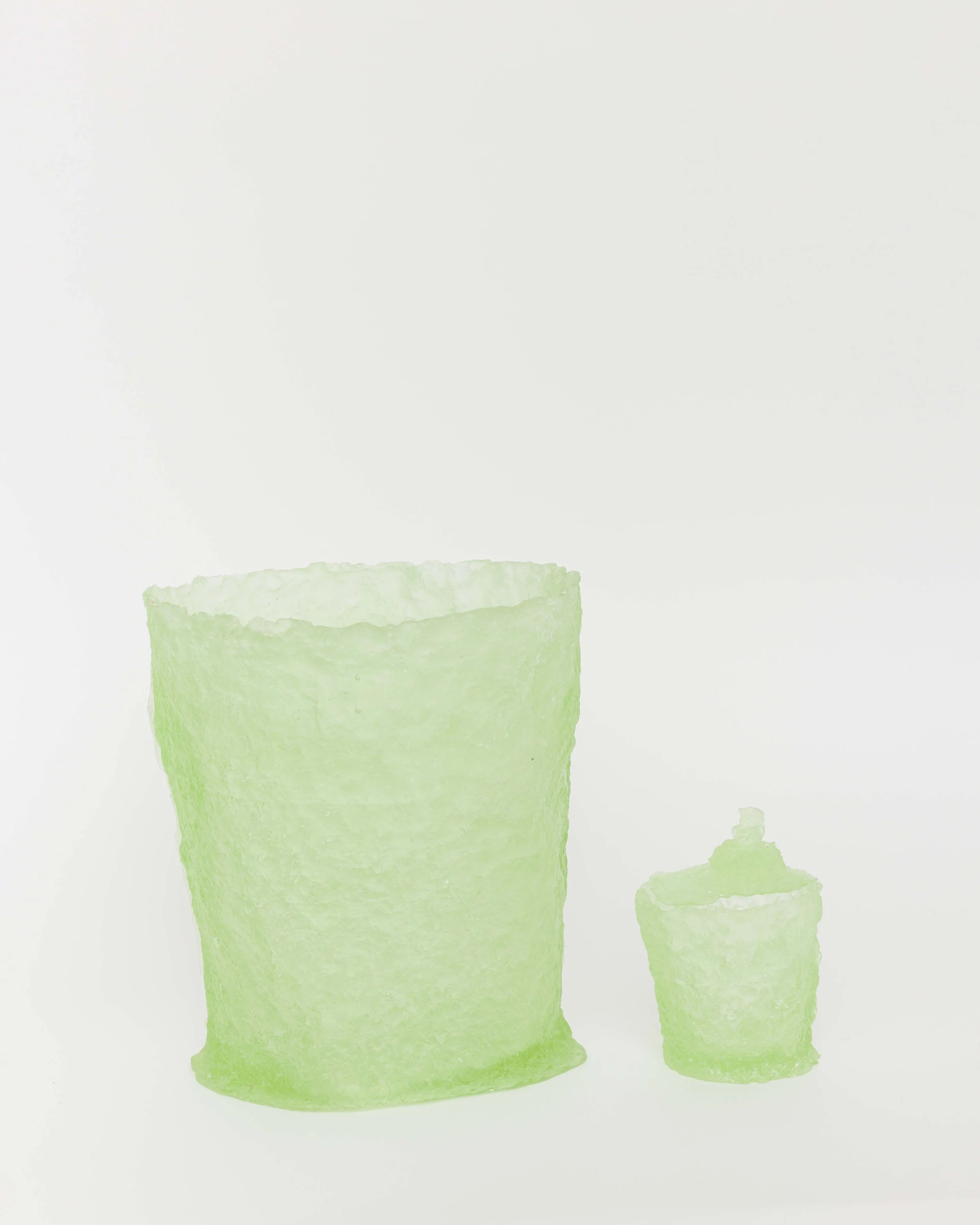  Vessel y Caramelero, cast glass, 10 x 7 x 9 inches (vessel 10 x 7 x 9, caramelero 5 x 4 x 4), 2022.    