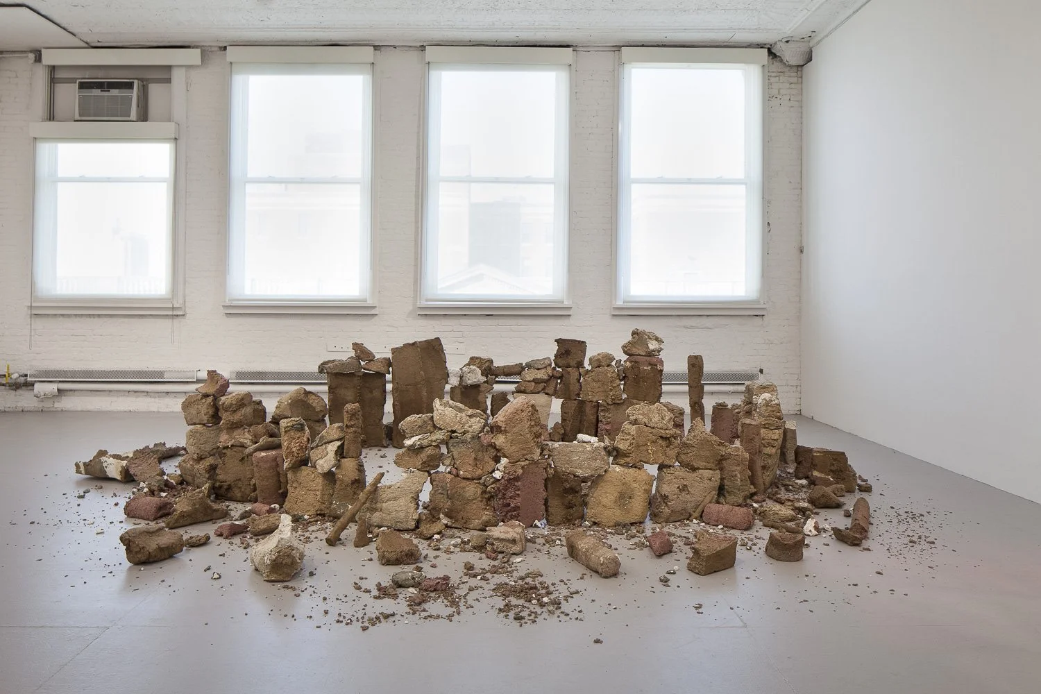   Dissolution , installation view, paper pulp, dimensions variable, 2016-2021, Greater New York 2021, Moma PS1.    