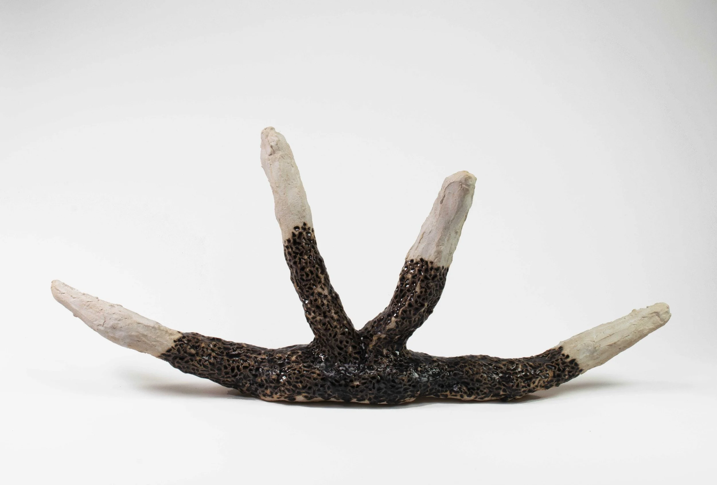   Esos sonidos sagrados , ceramic and glass, 15 x 34 x 5 inches, 2020.    