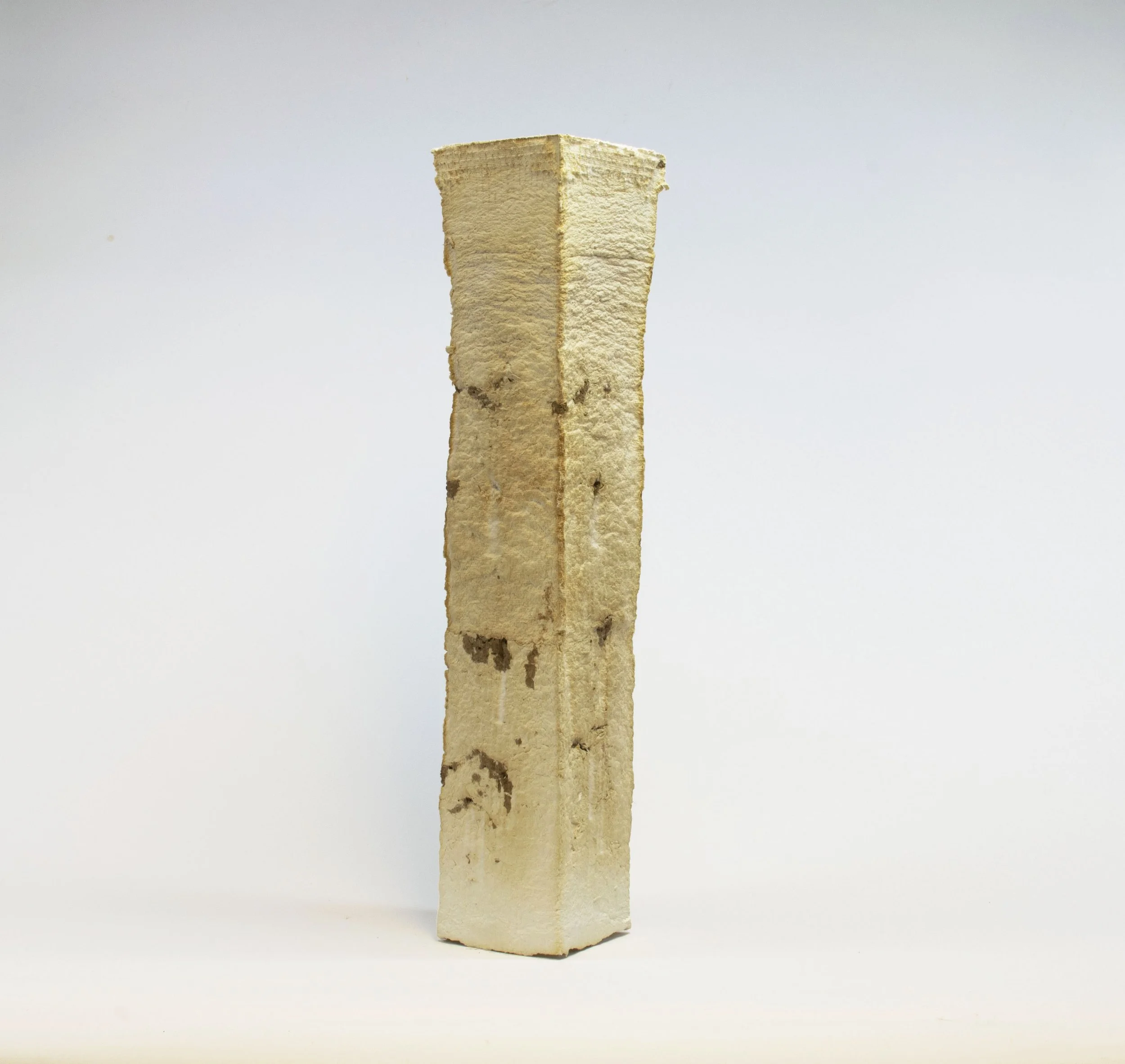  Torre, paper pulp, 25 x 5 x 5 inches, 2019.    