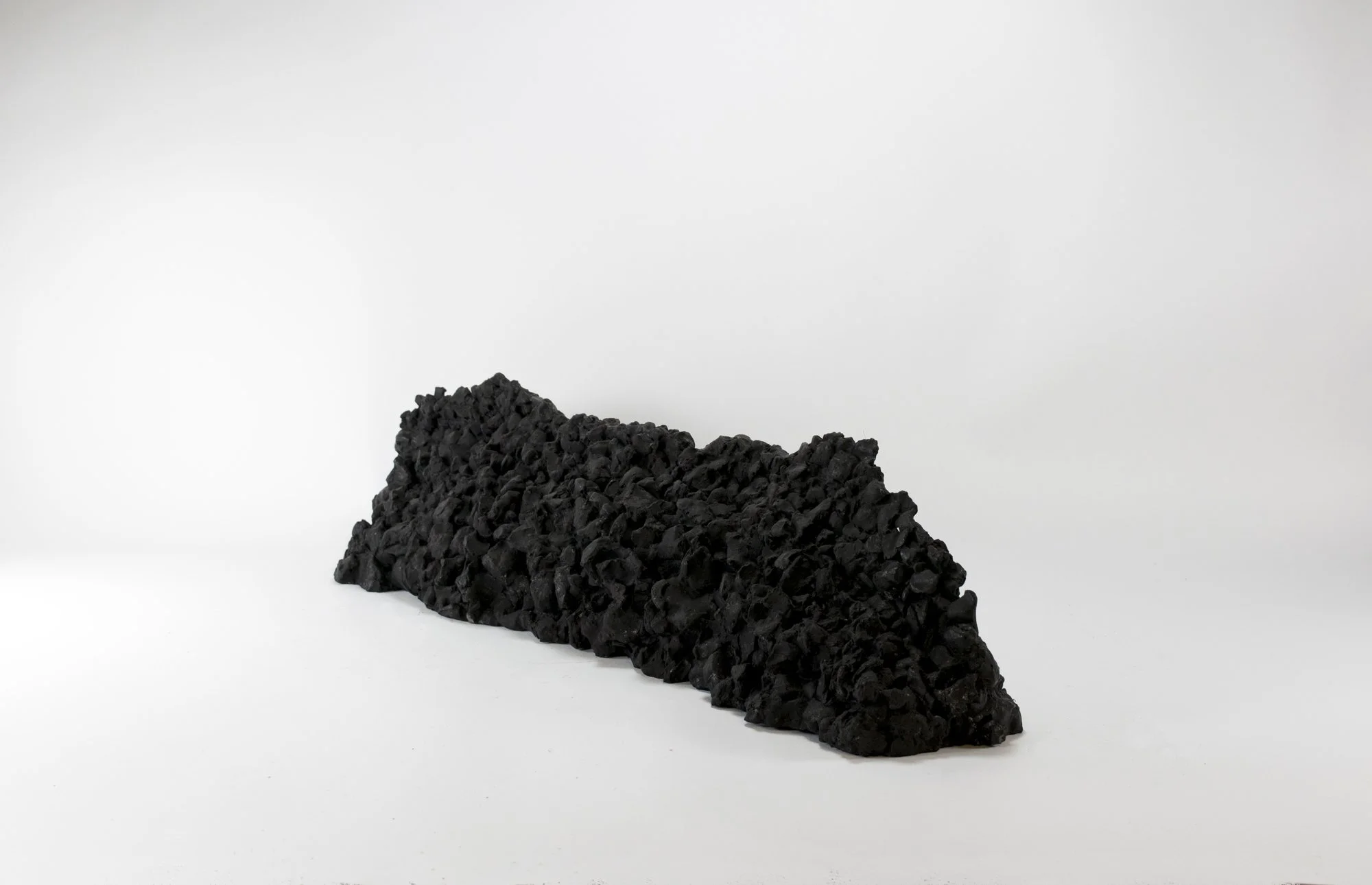  Bit by bit, plaster, 8 x 25 x 8 inches, 2014.    