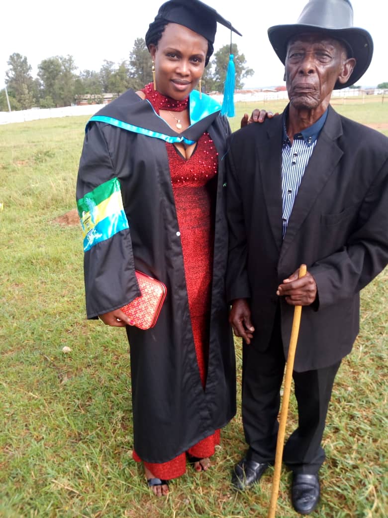 Jackie at graduation with her father