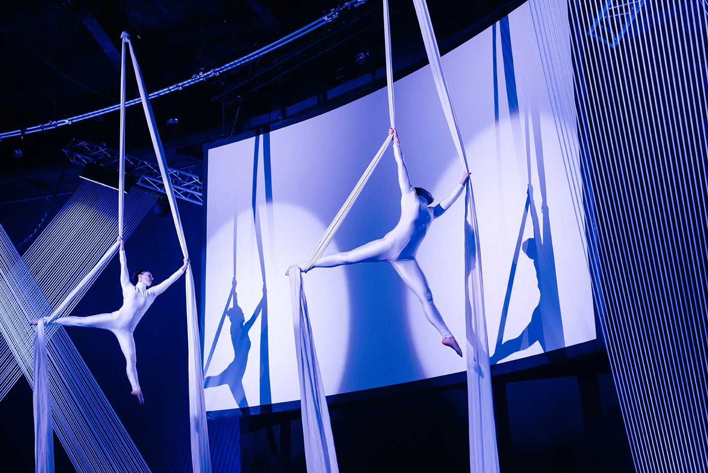 Double the impact with a synced choreographed silks act