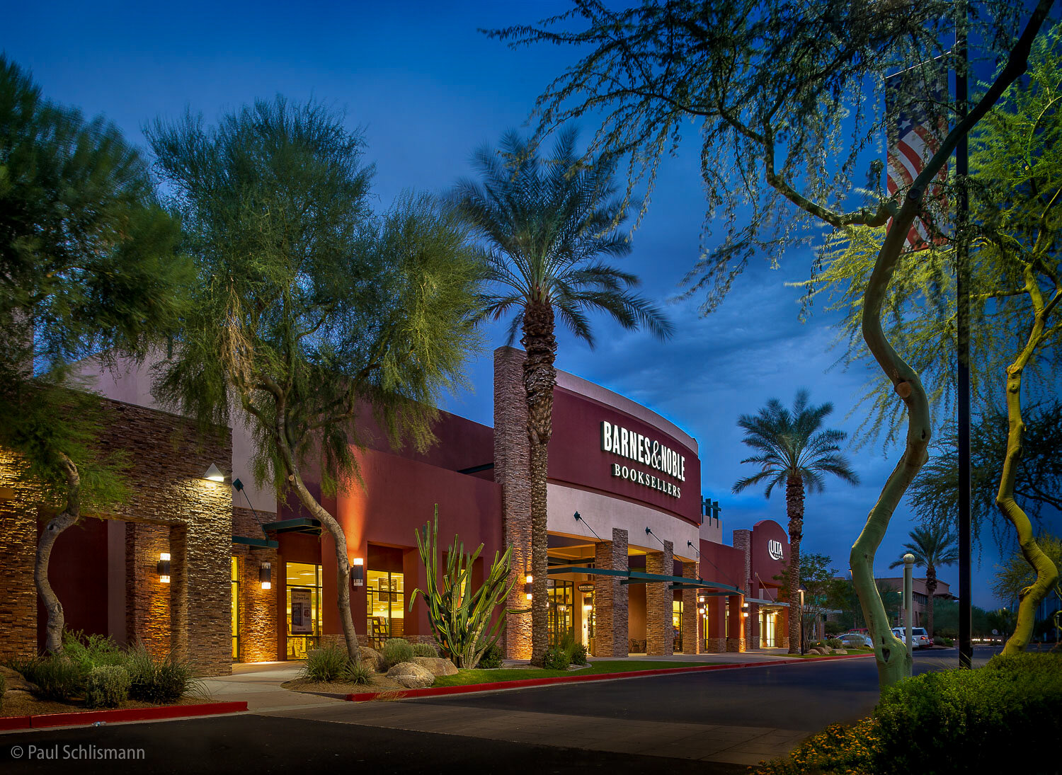 Dusk view of shopping center in CA