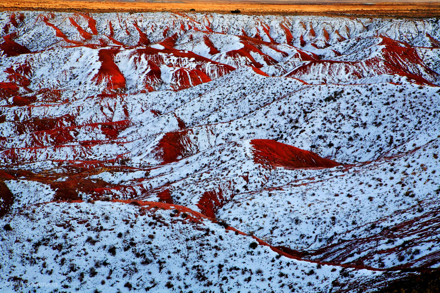 Snow covered mounds Painted desert.jpg