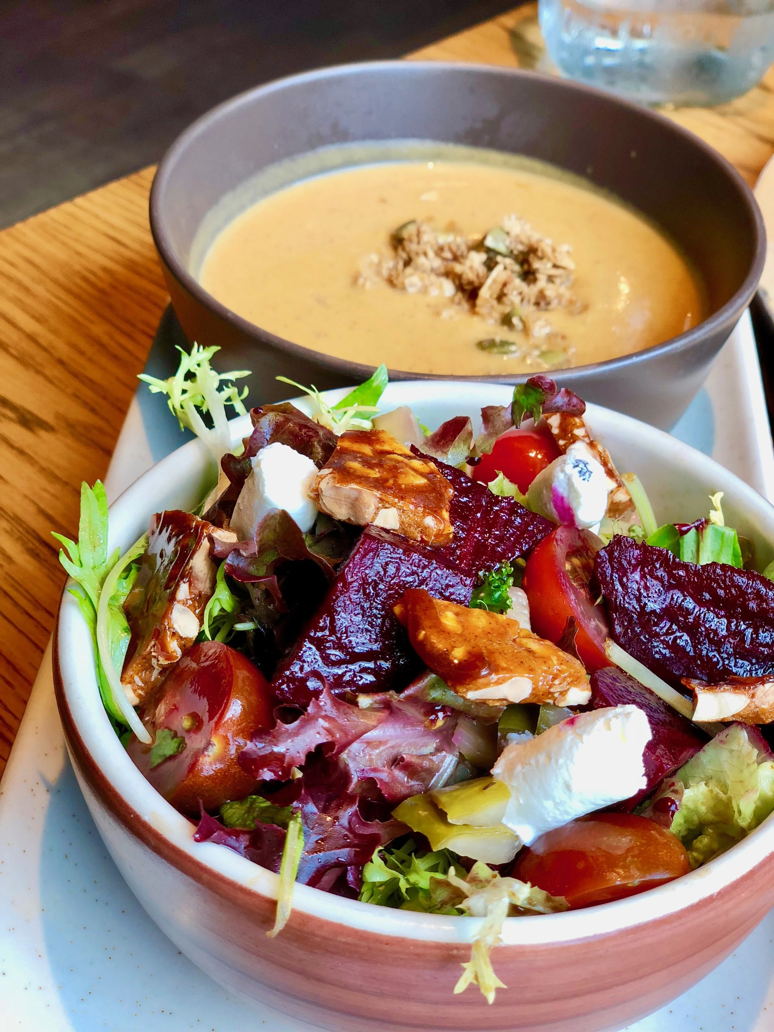 Here's the harvest salad. I'm ignoring it because this post is about the roasted sweet potato soup, but the salad is worthy of its own feature. I chose it only because I saw it had red verjus braised beets, and I adore beets in salad; I didn't read further. The salad is comprised of ultra-fresh mustard greens as well as whipped feta (phenomenal), little heirloom tomatoes, and an almond brittle that also deserves its own spotlight.