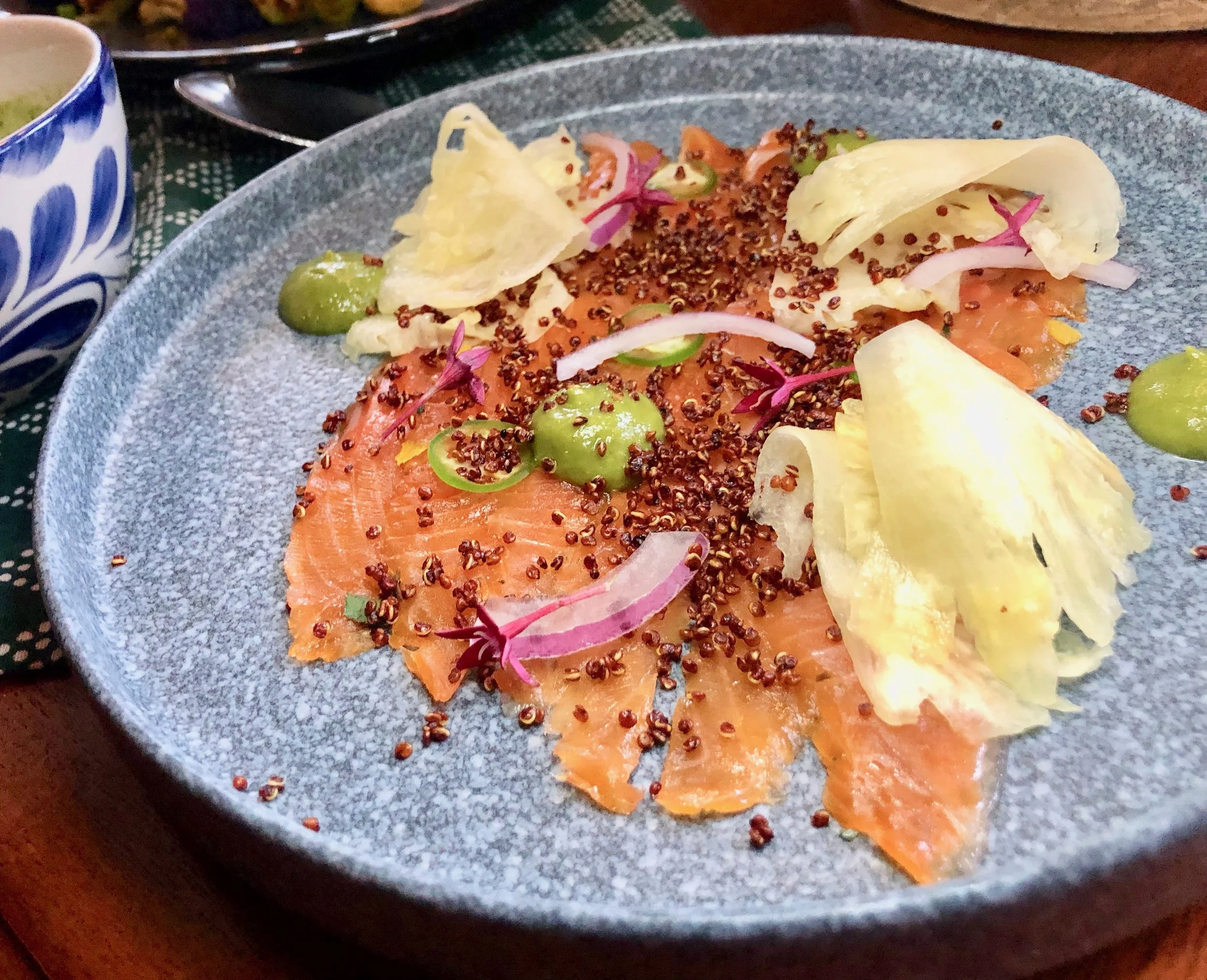 Reyes Mezcaleria – Arctic Char Aguachile. Essentially, this fish dish tastes like a good smoked salmon. It’s served with pineapple aguachile – kind of a refreshing marinade, as well as puffed quinoa, avocado, red onion and serrano pepper.