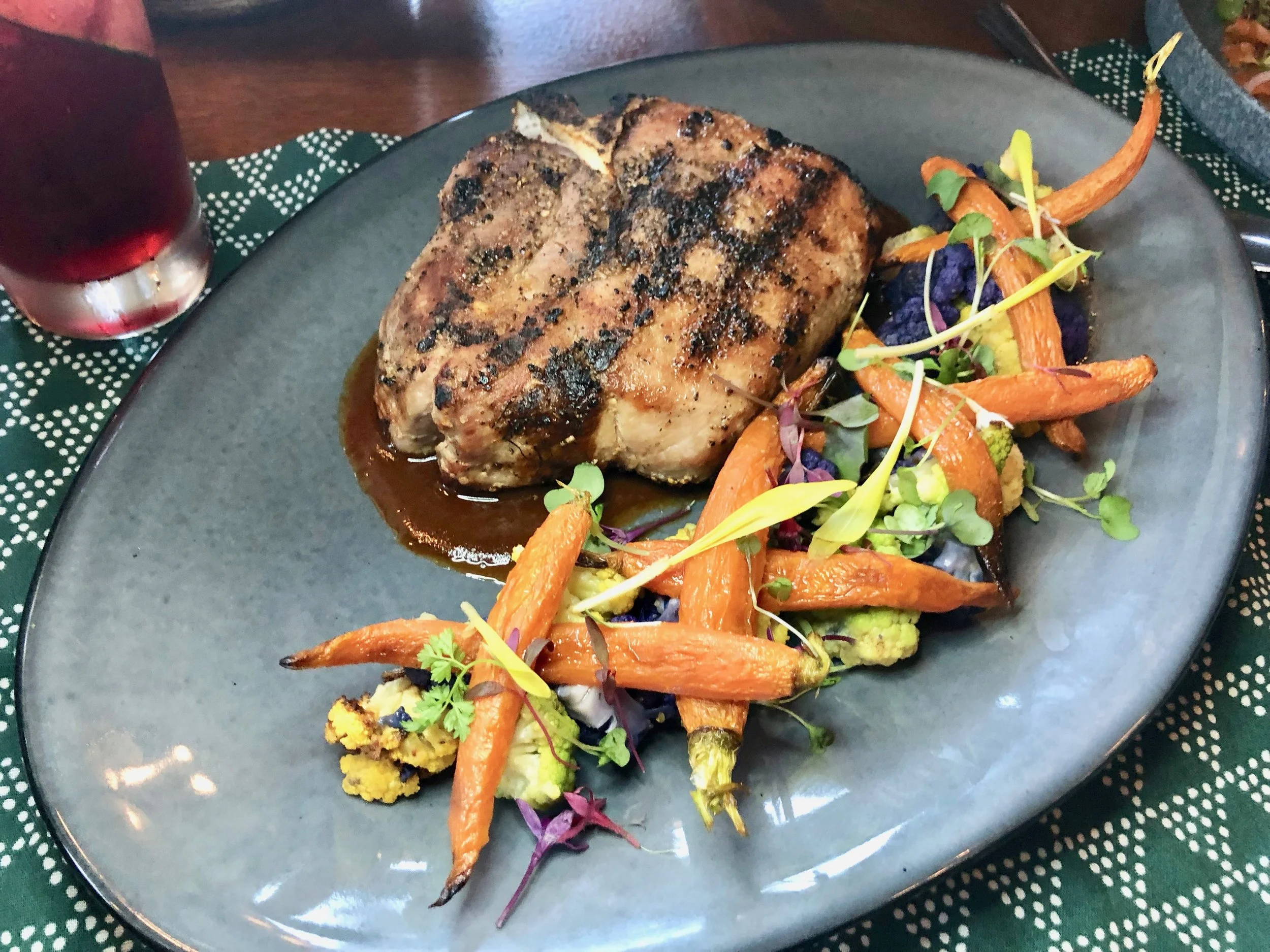 Reyes Mezcaleria – Grilled Pork Chop. The pork with a peanut mole sauce was pretty popular too, as were the roasted cauliflower and baby carrots. I had to sneak more and more of those onto my plate too without looking piggy.