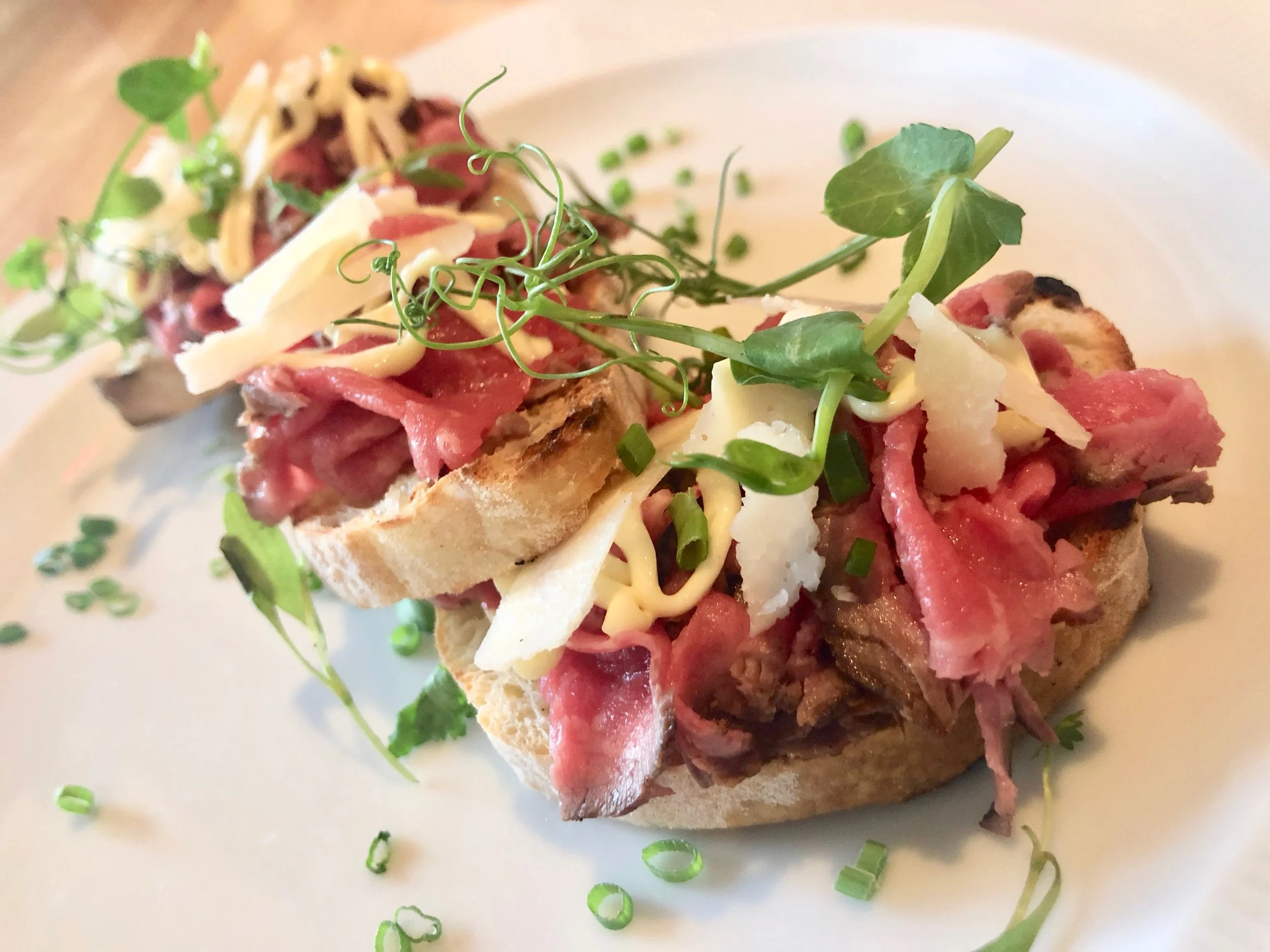 Ravello – Bruchetta Albese. Country bread topped with beef tenderloin, truffle aioli, lemon and parmesan. It’s a meal, really. Gobble, then pack the rest to go.