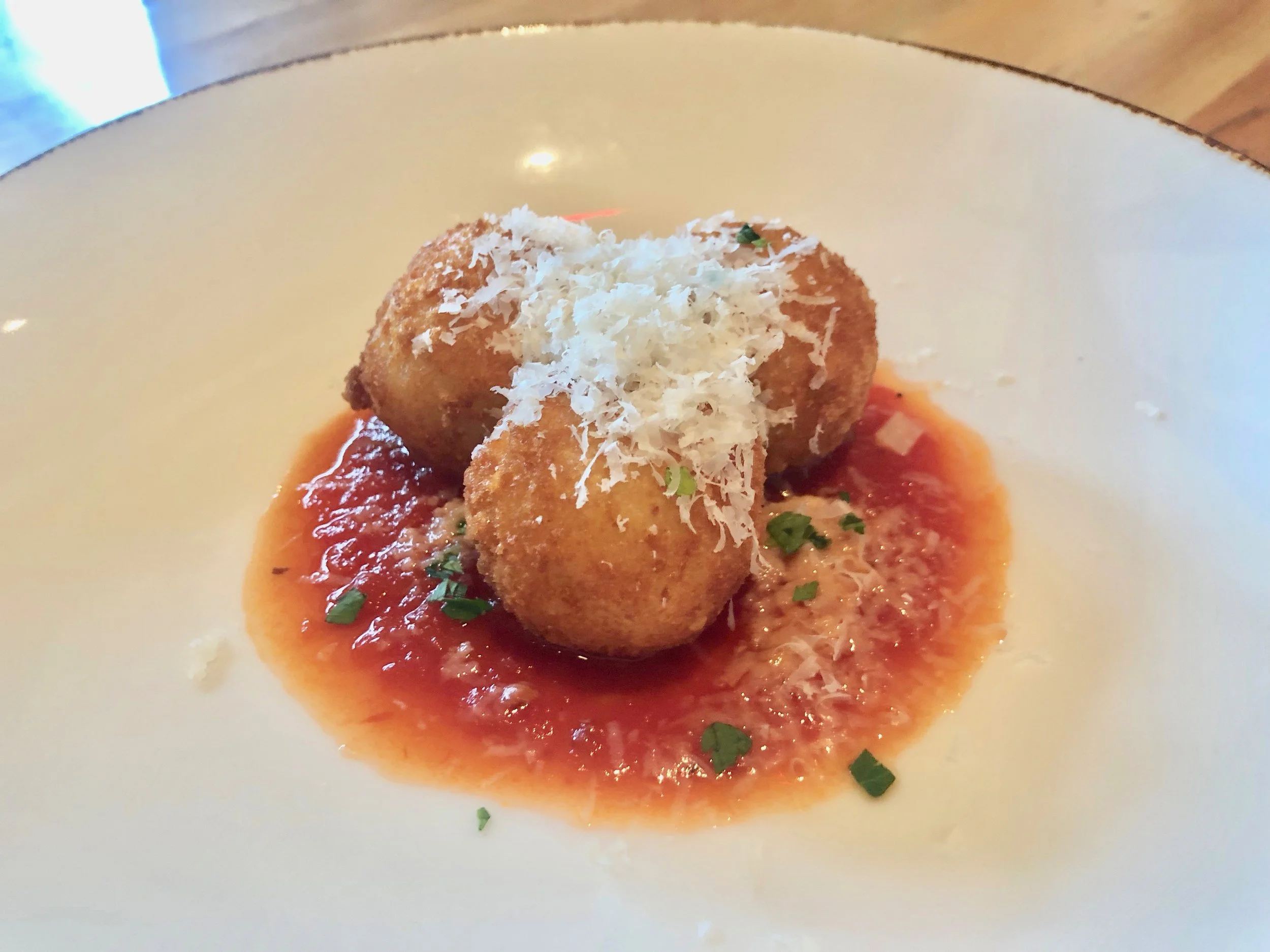 Ravello – Arancini. Crispy risotto balls atop a pomodoro sauce with mozzarella and tomato. It was nice enough, but I wouldn’t choose it over the other foods offered.