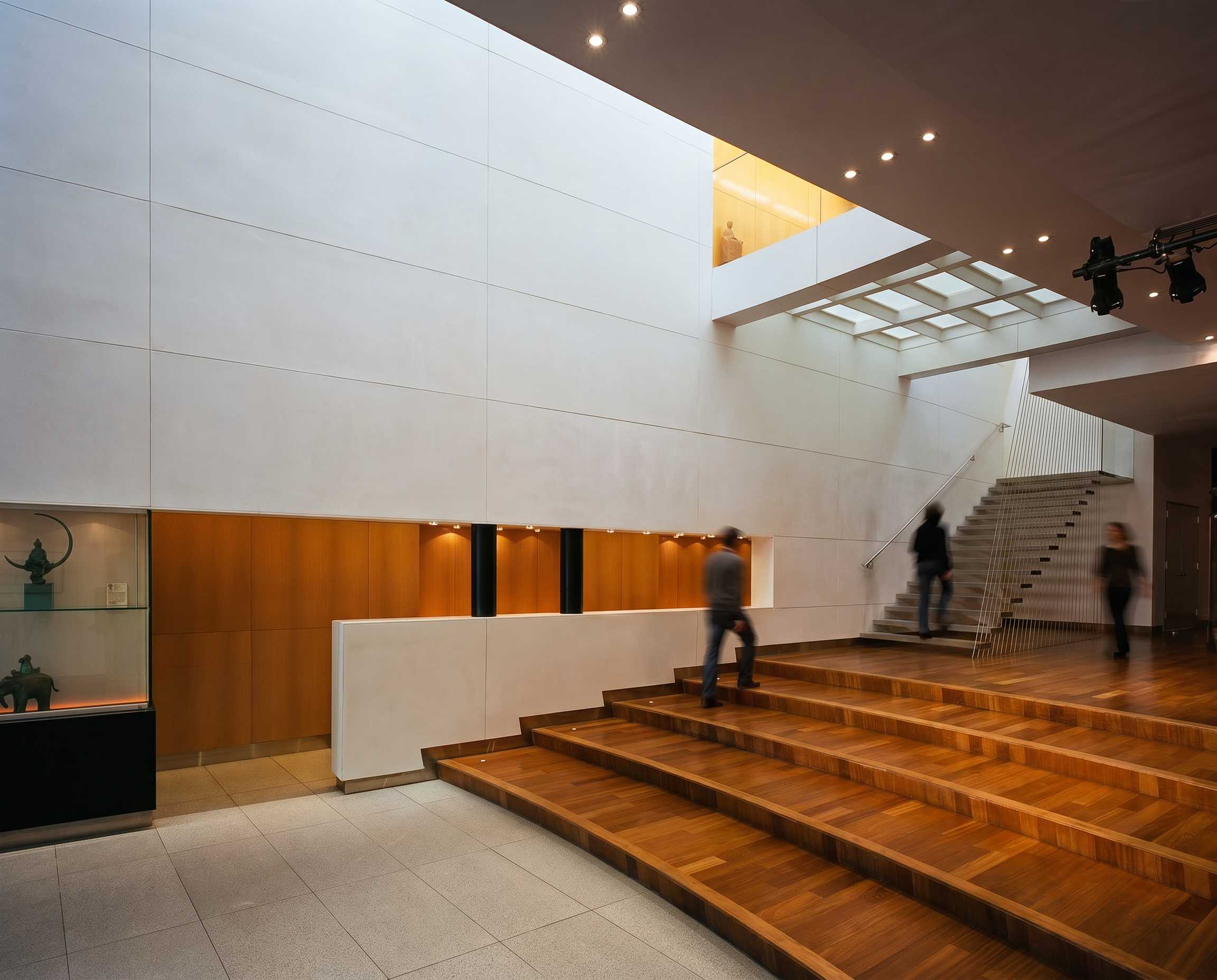 Double-height atrium and exhibition space viewed from ground level at the Taipei Economic and Cultural Office