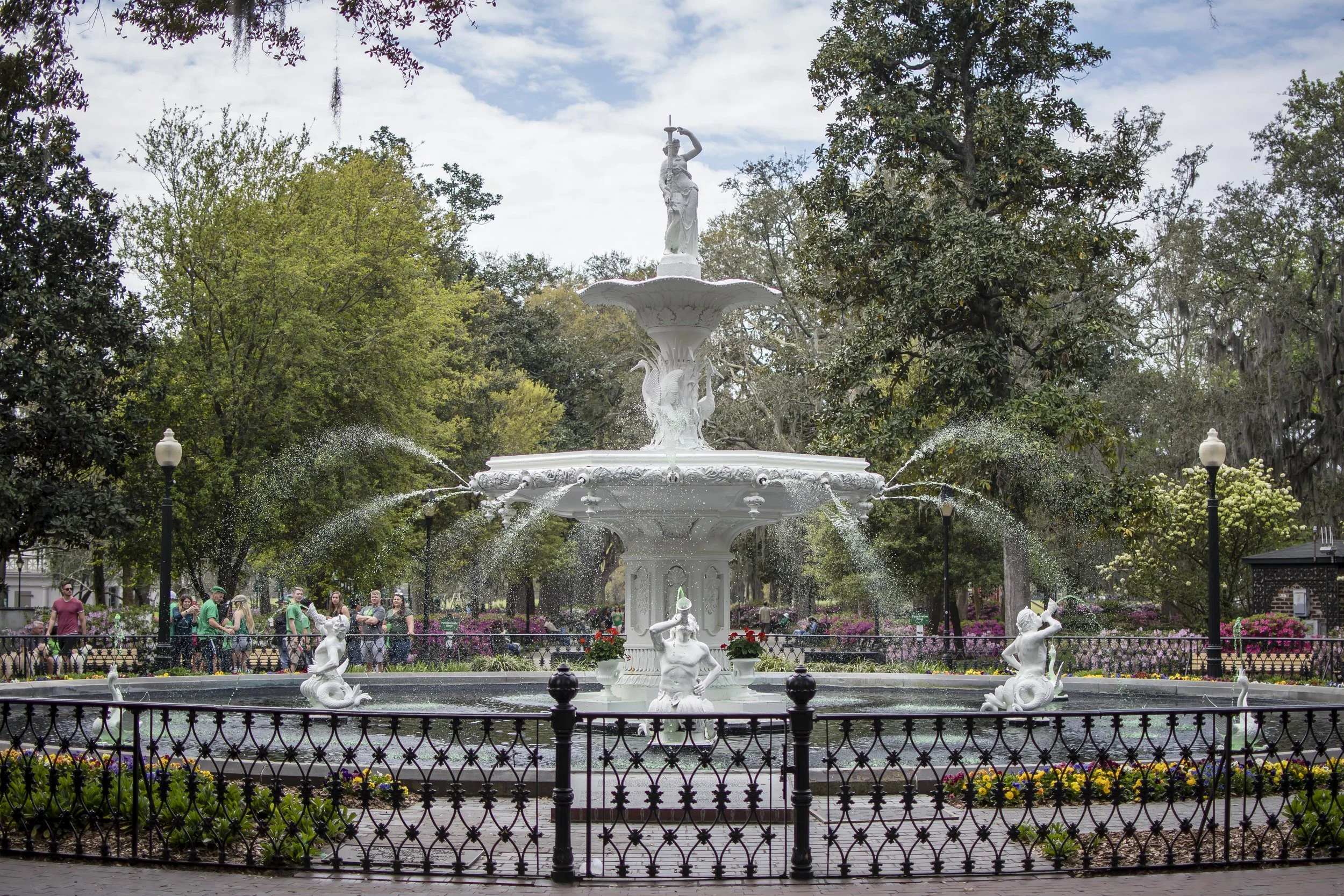 The all so beautiful, Forsyth Park Fountain, was also in the spirit of the St. Patrick's Day celebration with hints of green-colored water.
