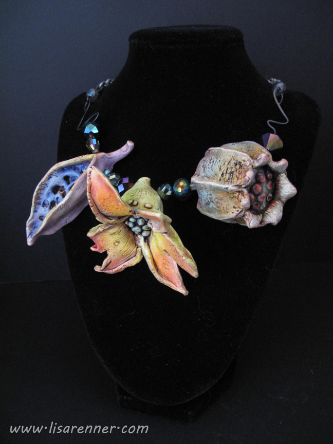 This is a Polymer Clay Pod necklace I made after taking Doreen Kassel's on-line workshop.