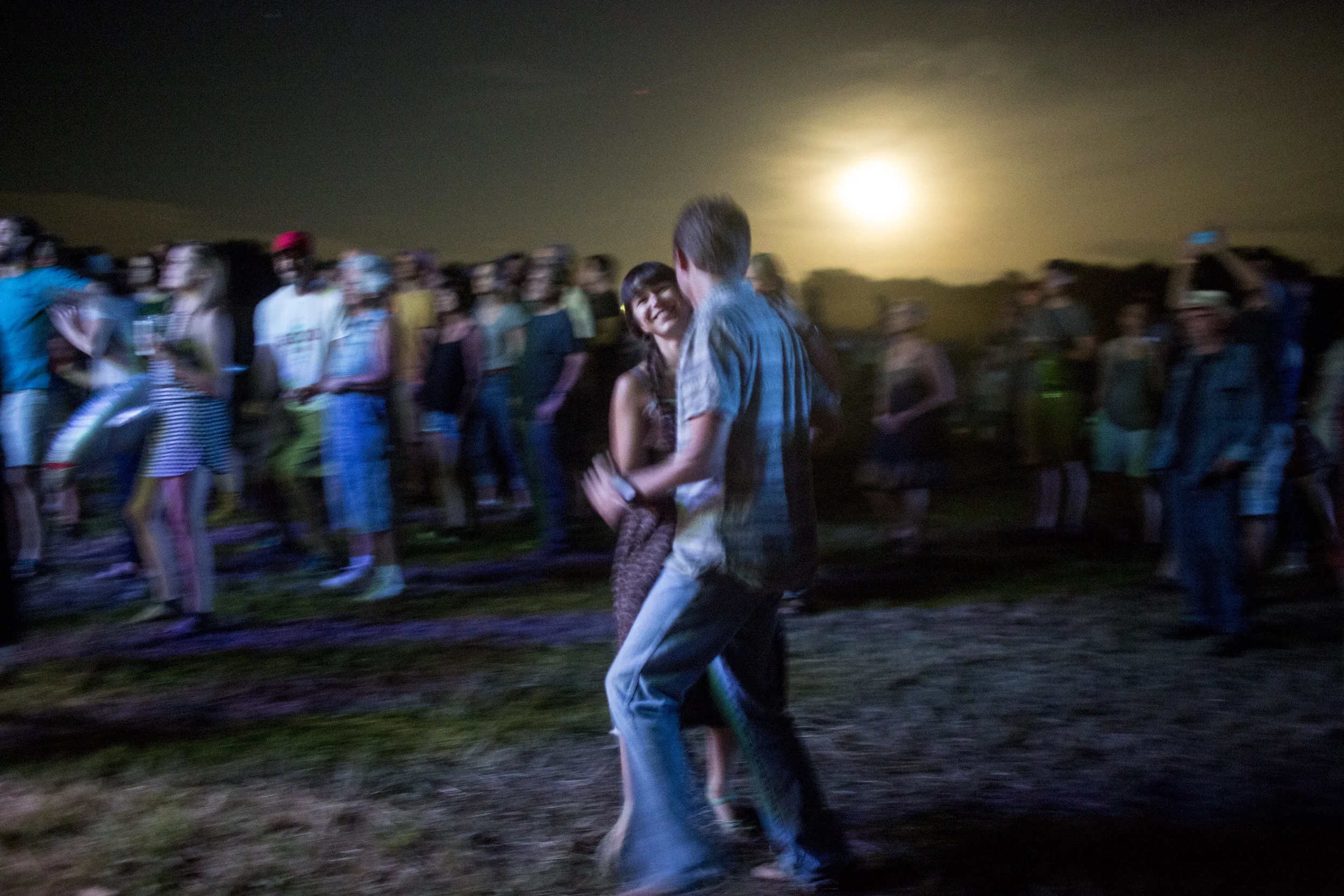  A couple dances in the moonlight during the 2015 Nebraska Folk and Roots Festival in Raymond, Nebraska. 