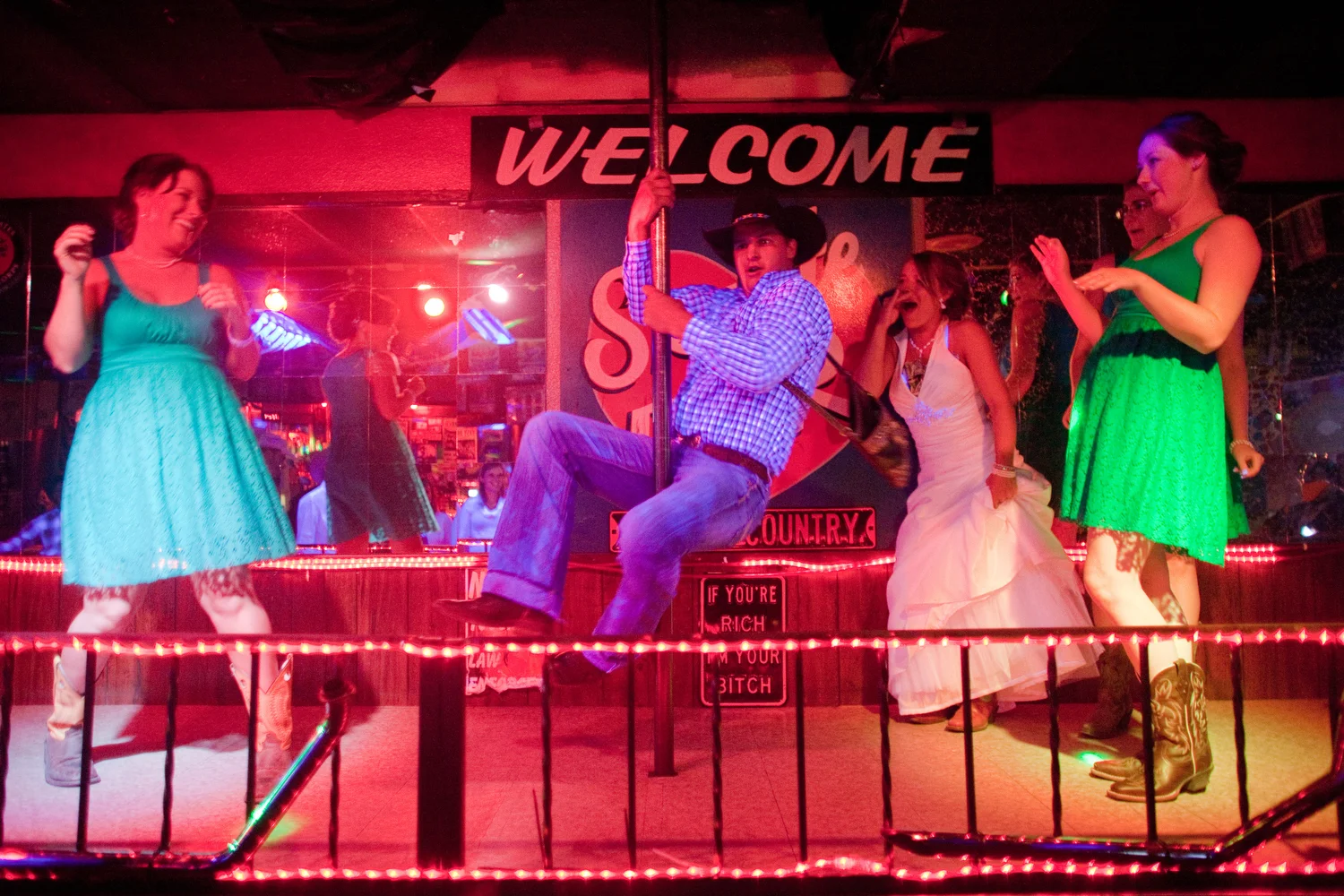  A wedding party takes over the stage at Skylite Bar in Valentine, Nebraska. 
