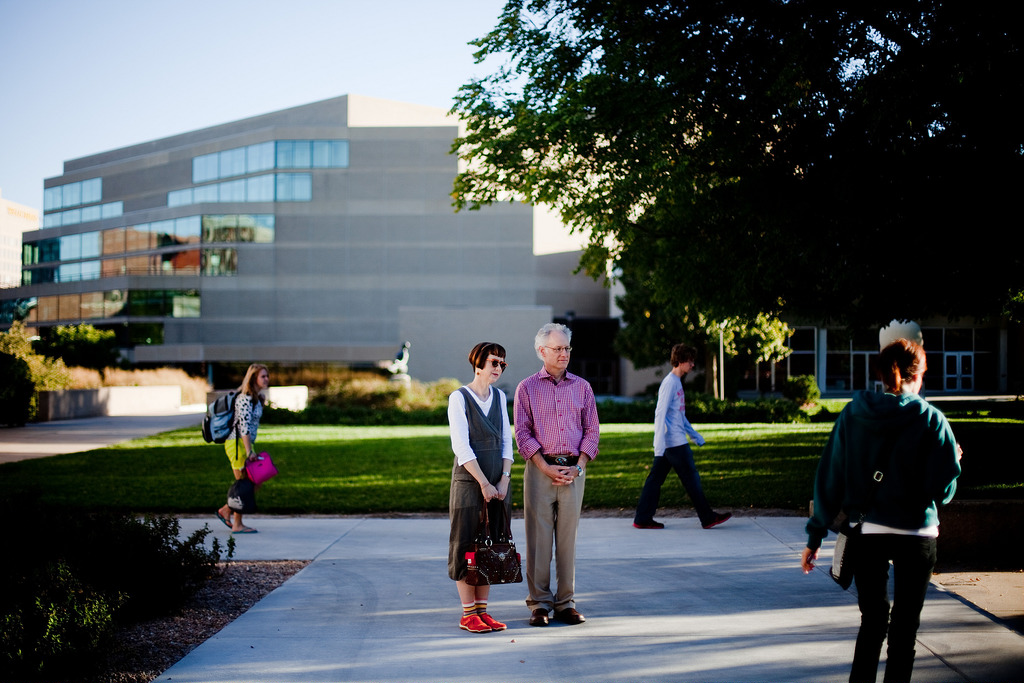  A man and a woman watch a Native American dance performance outside the Sheldon Museum of Art in Lincoln, Nebraska. 