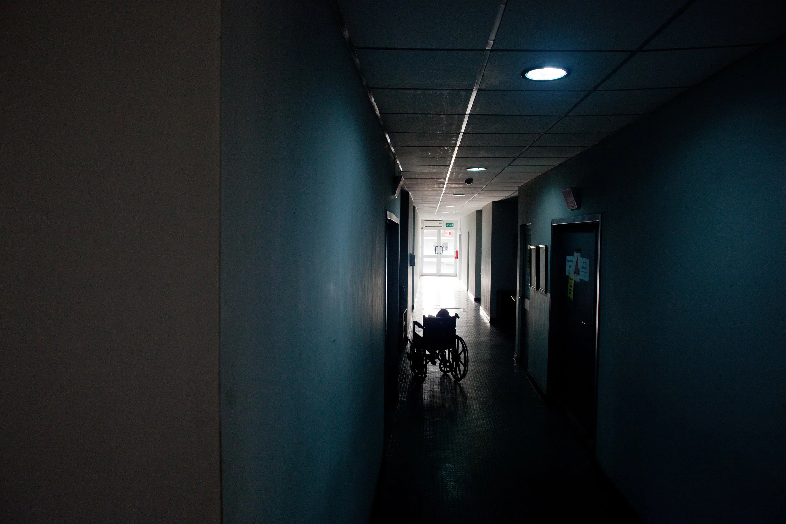  Sisay waits in a hallway for a post-operation X-ray. 