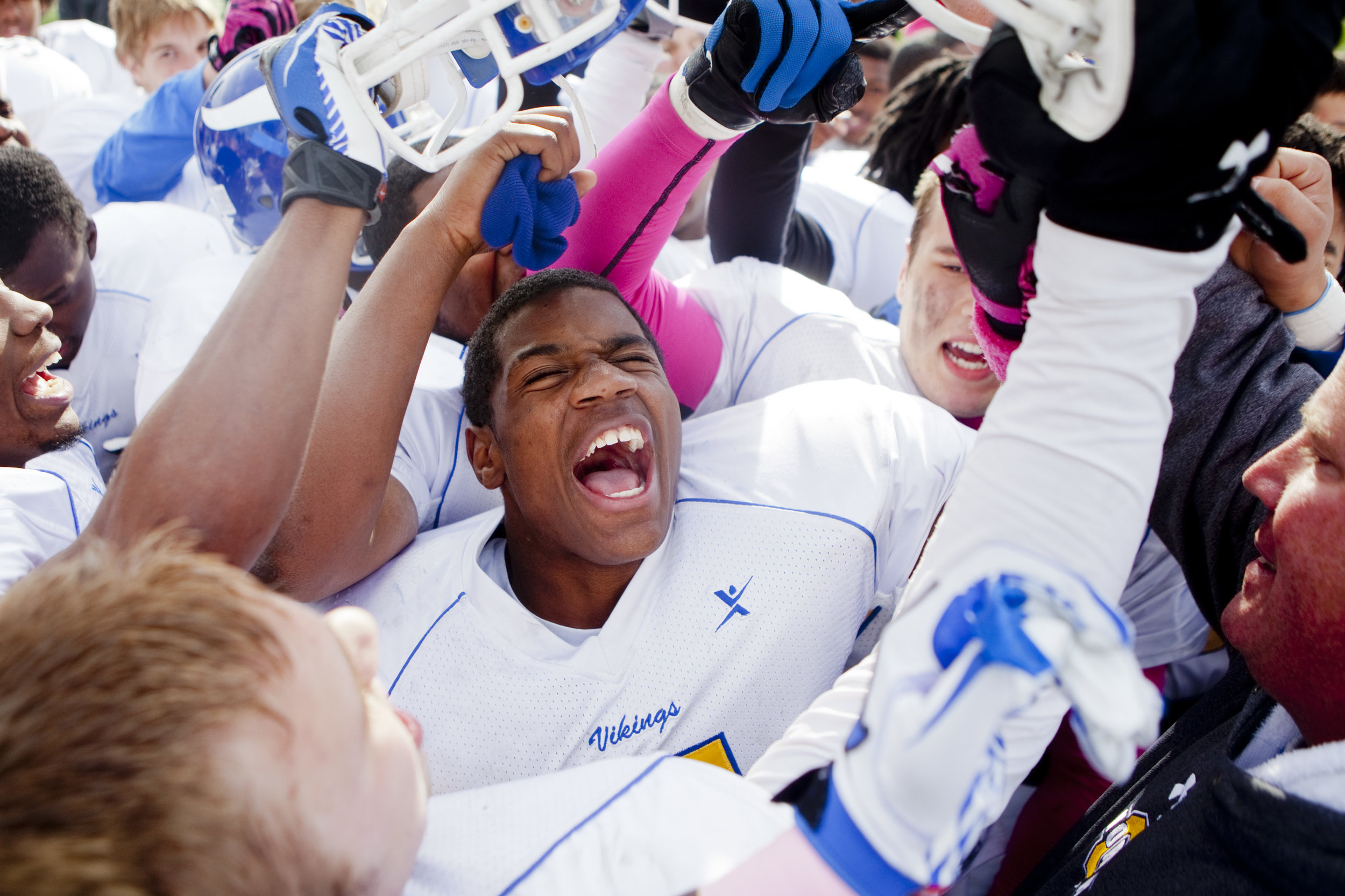 Omaha North players celebrate their 28-10 win over Lincoln Southwest in the Nebraska State Football Playoffs at Seacrest Field in Lincoln, Neb., on Oct. 26, 2012.