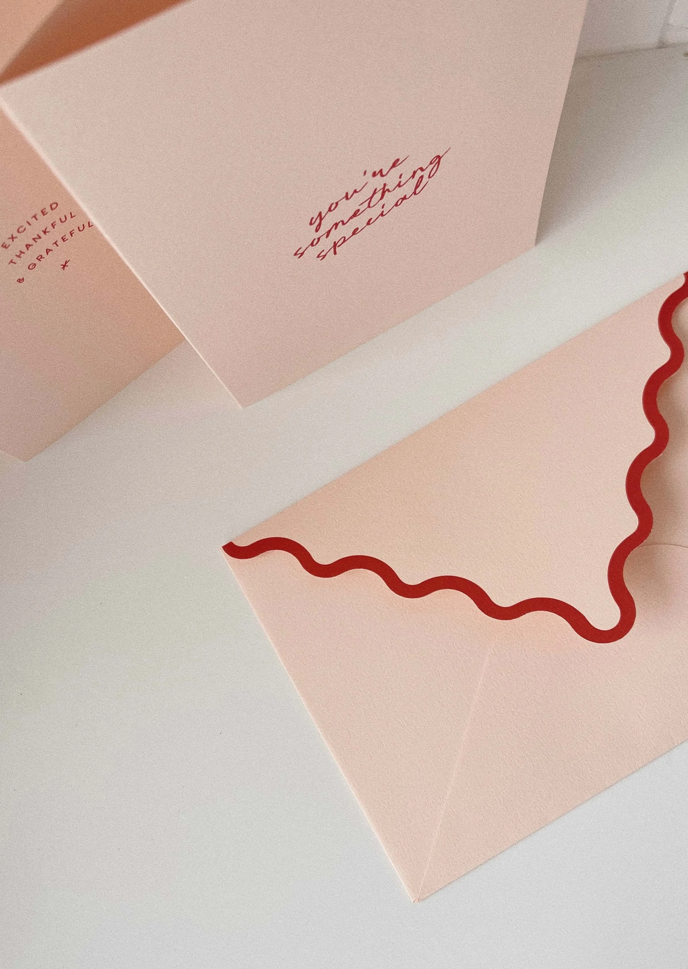 pink and red scalloped notecards