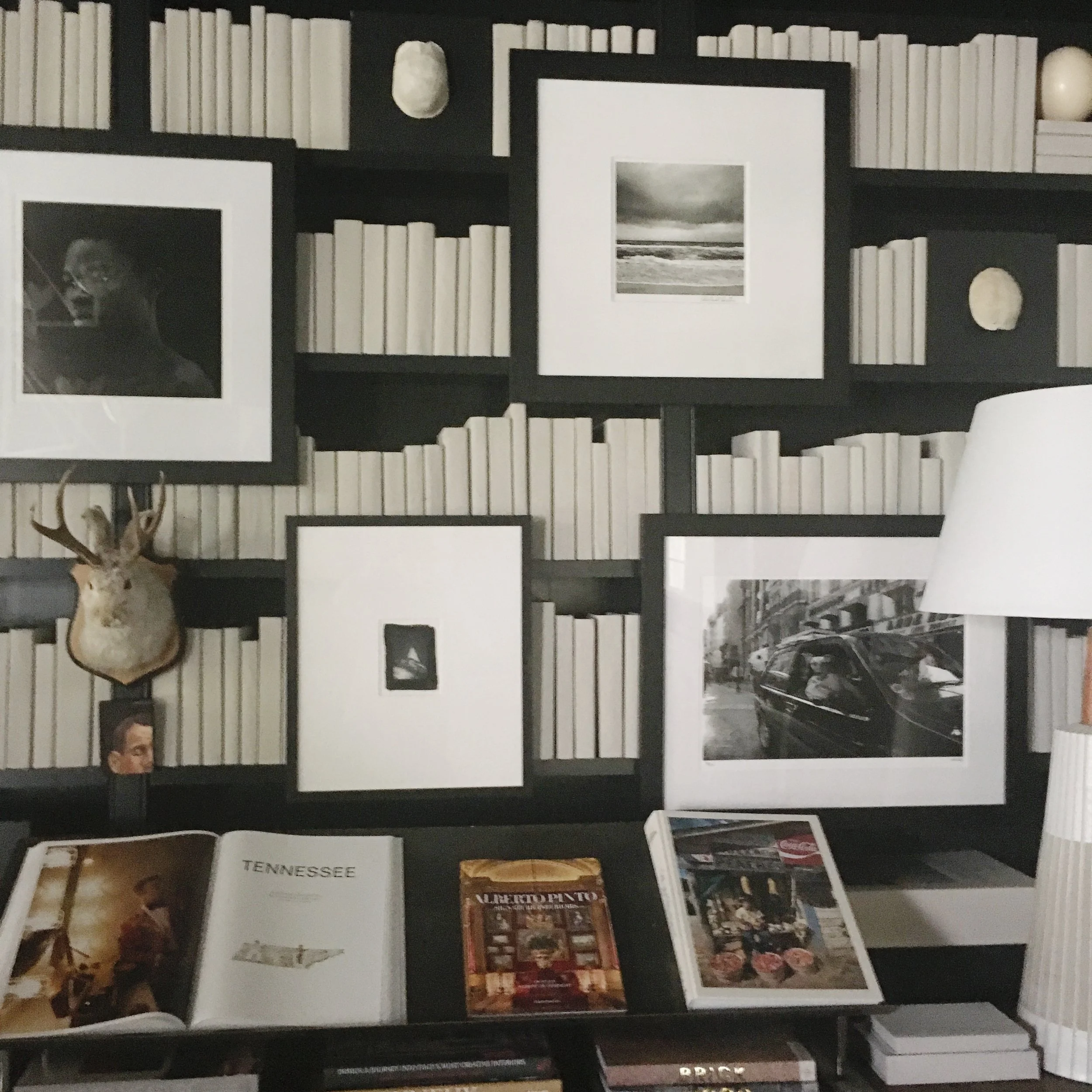 Chad James' gallery wall in The Library