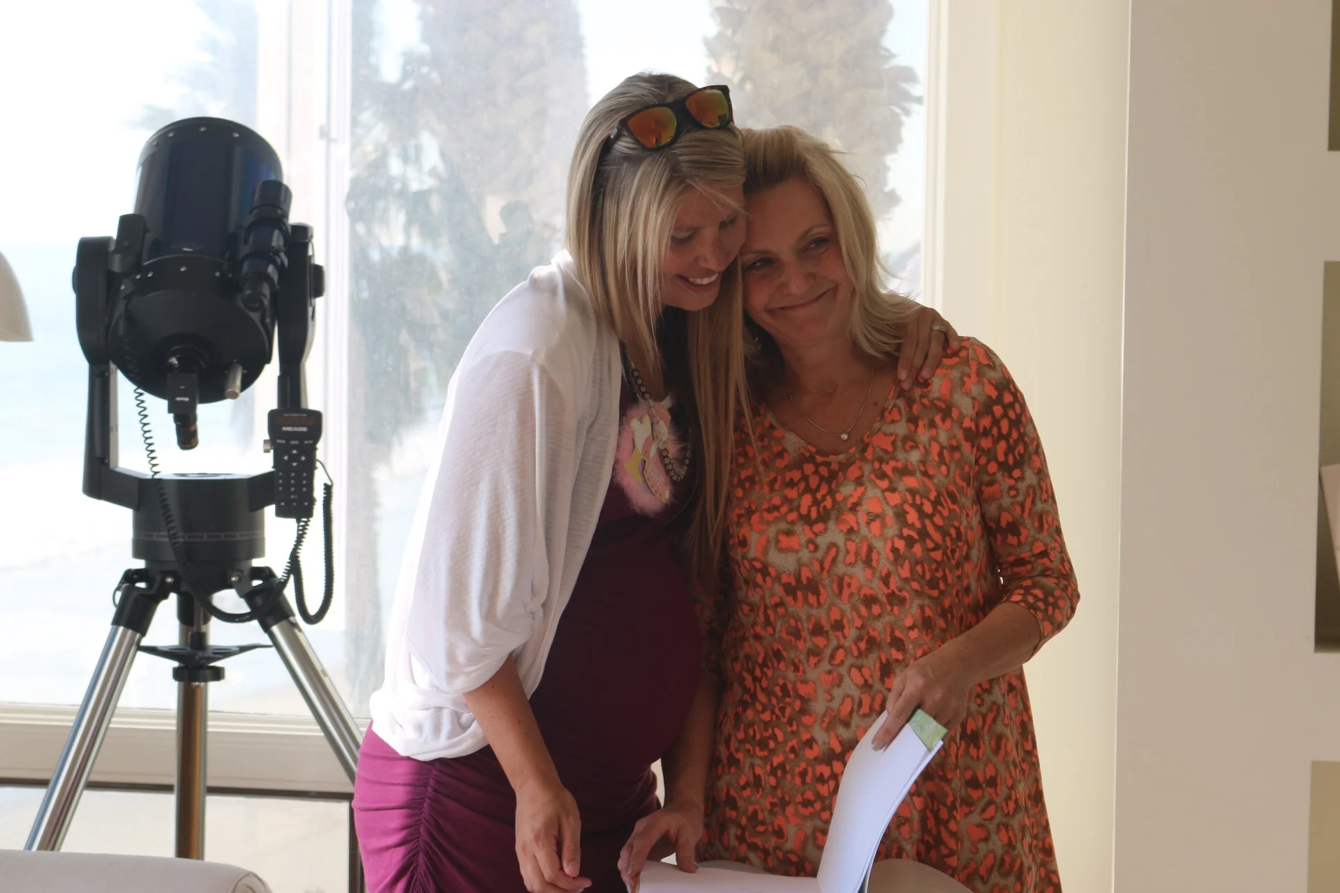 A picture of my own mother at my baby shower. Three generations of women present in this photo (one just still in the belly).