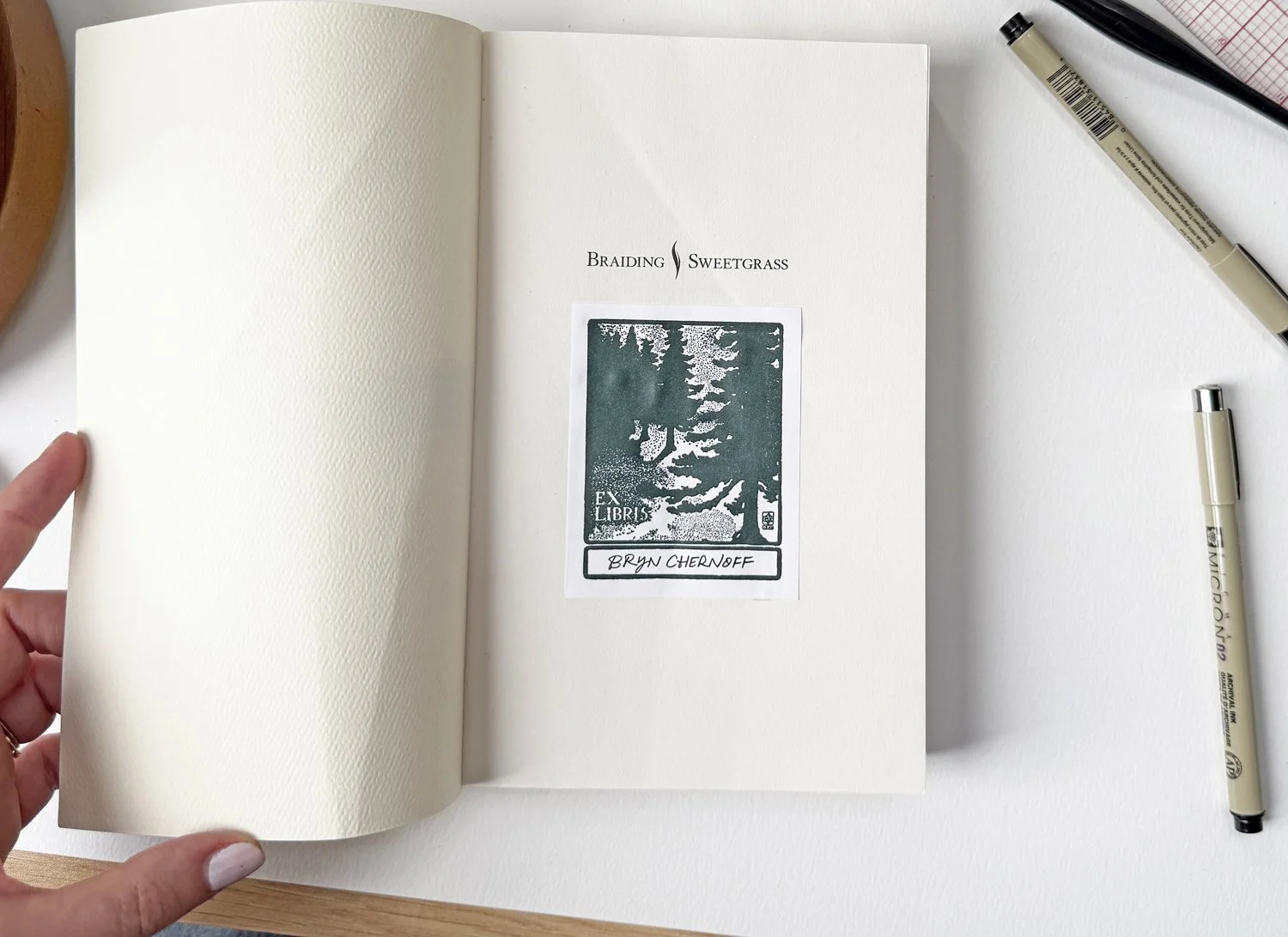 Paperfinger-SPress-Bookplate-Trees-onBook-2.jpg