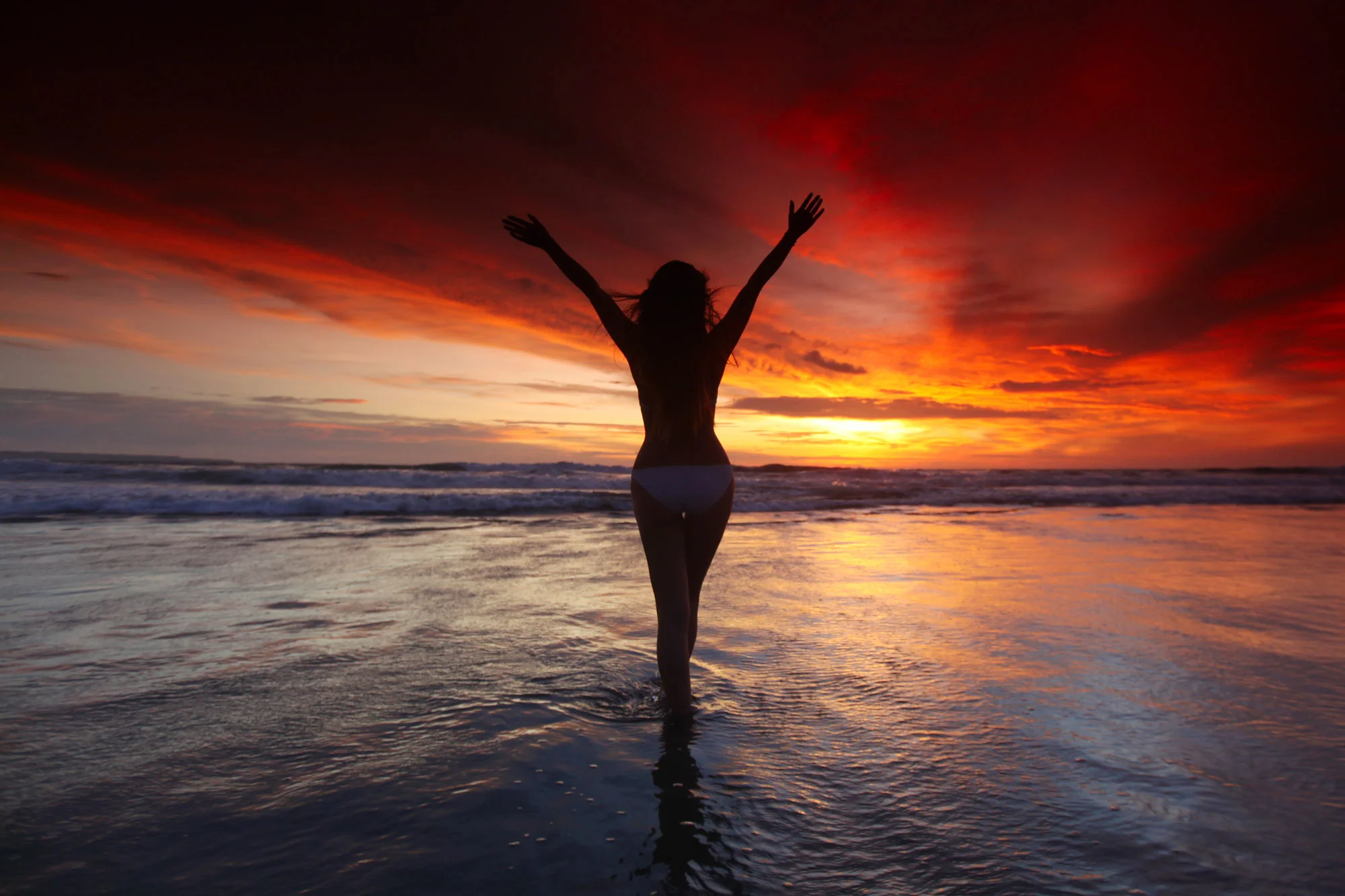 Womanonthebeachatsunset.jpg
