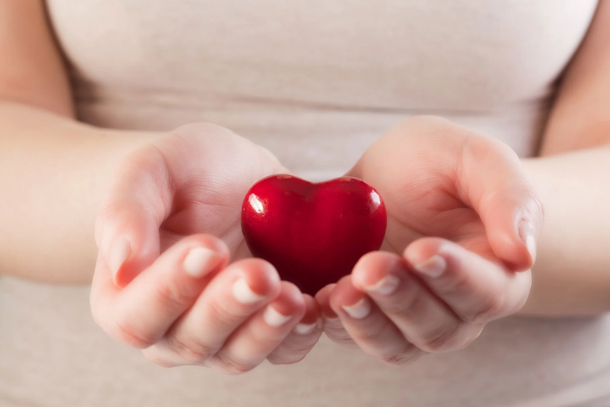 Heartinwomanhands.Lovegivingcarehealthprotection..jpg