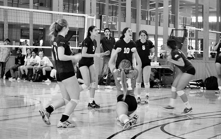Tiffany (#10) celebrates with her teammates during a tournament with the University of Nevada Reno club team