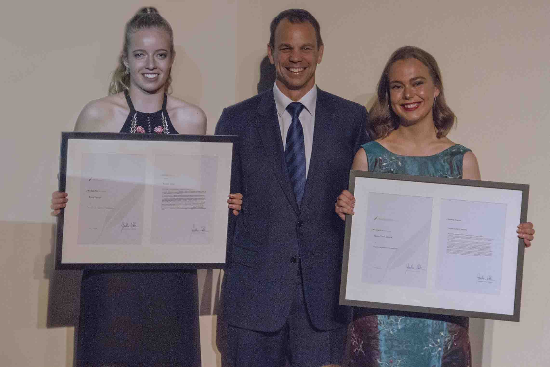 The 2016 Woodleigh Prize Winners Romy Lipszyc, left, and Nixie-Claire Lepore, right, with Woodleigh School Principal Jonathan Walter.