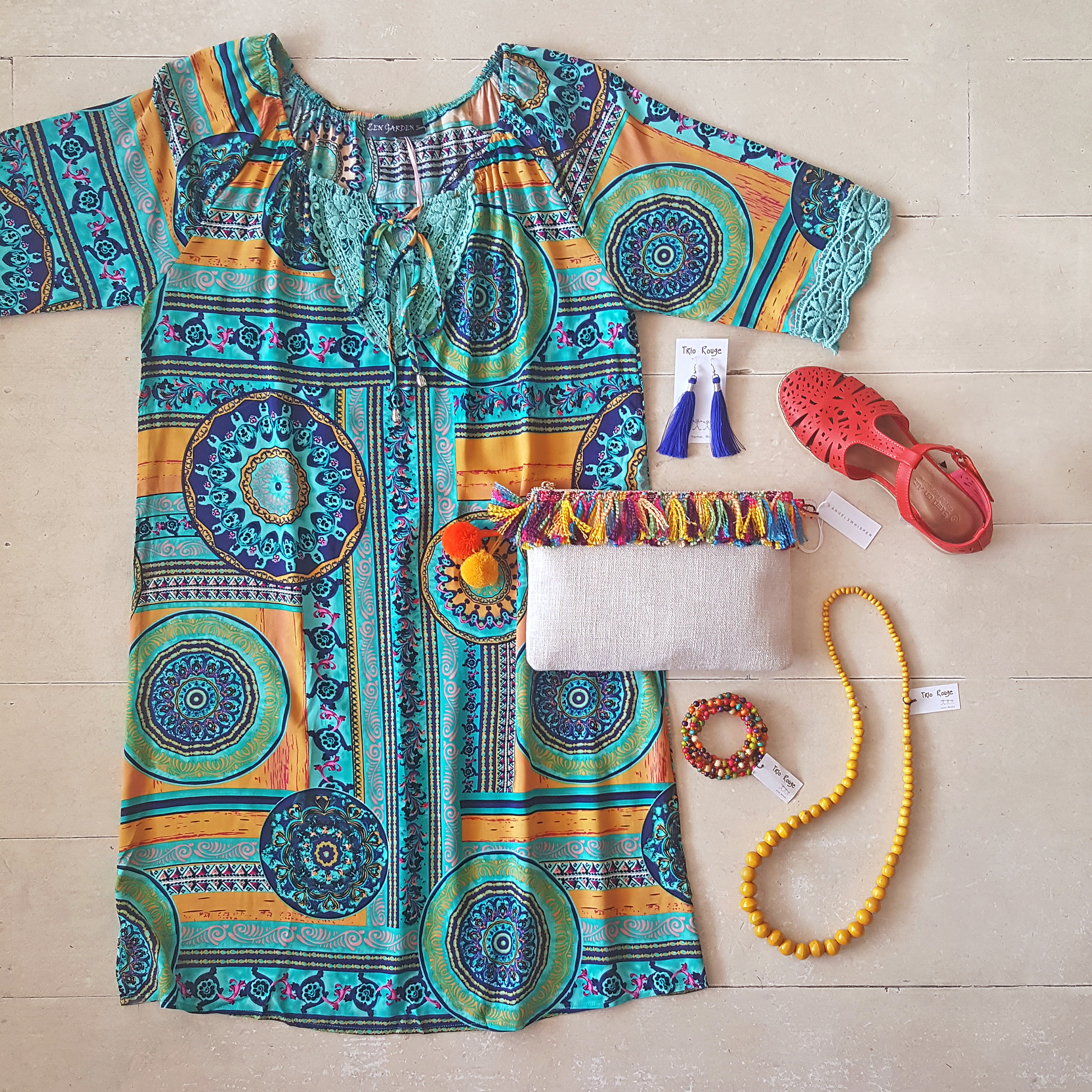 A glimpse of Yo-Ko’s colourful summer stock: dresses, summer sandals, and jewellery.