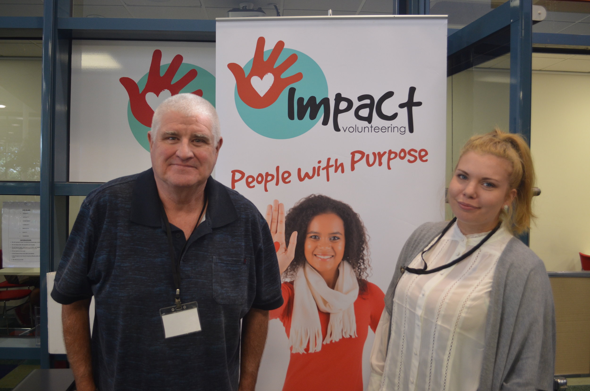 Volunteers Mark and Sharnie at the Impact Information and Referral Desk in Frankston Library.