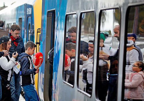 CAPTION 2 Kids getting on train 01.png