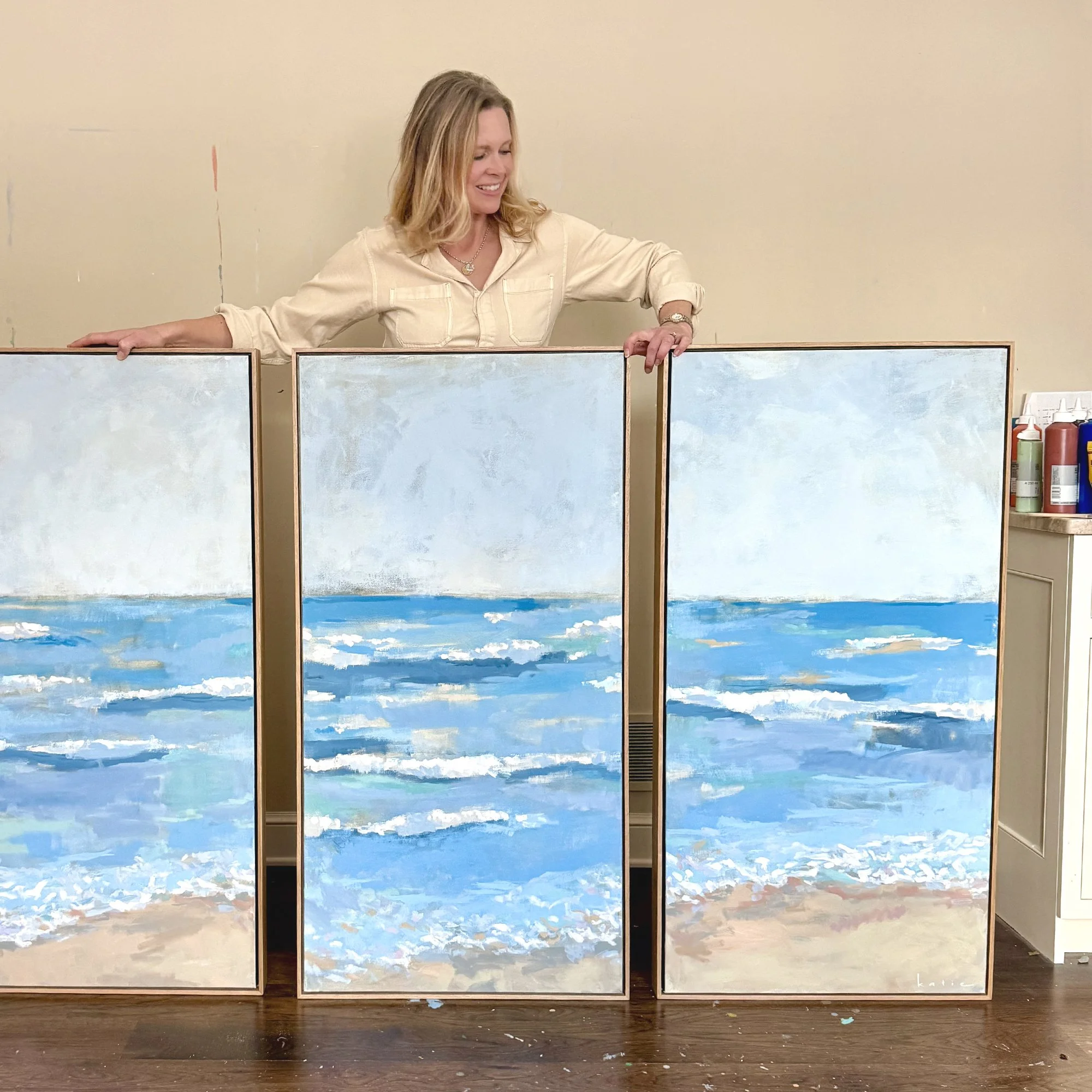 Artist Katie Flermoen and a recent triptych commission piece