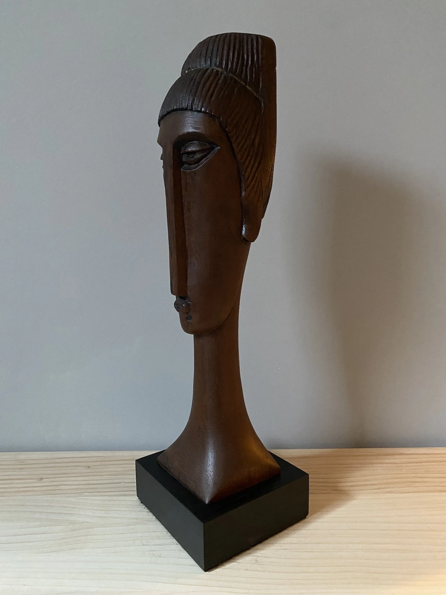 ‘Cleo I’ carved timber bust by Theo Bremer, 1980, in the style of Modigliani