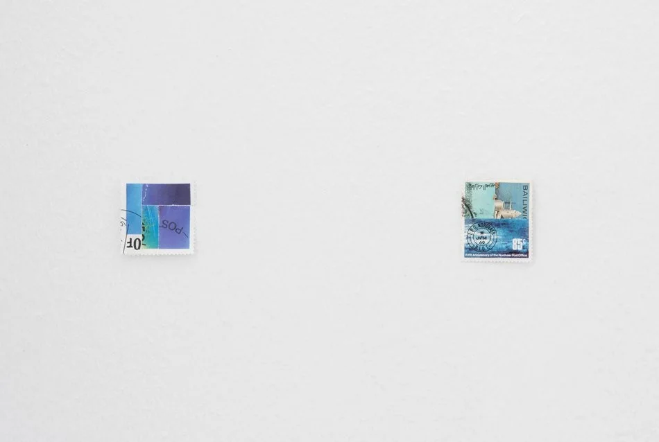 The sea is not a metaphor, 2015, postage stamps, sea salt held in a half globe, as if by cupped hands with Kate Meakin at Værelset , Copenhagen Curated by Kim Brockett / Photo: David Stjernholm