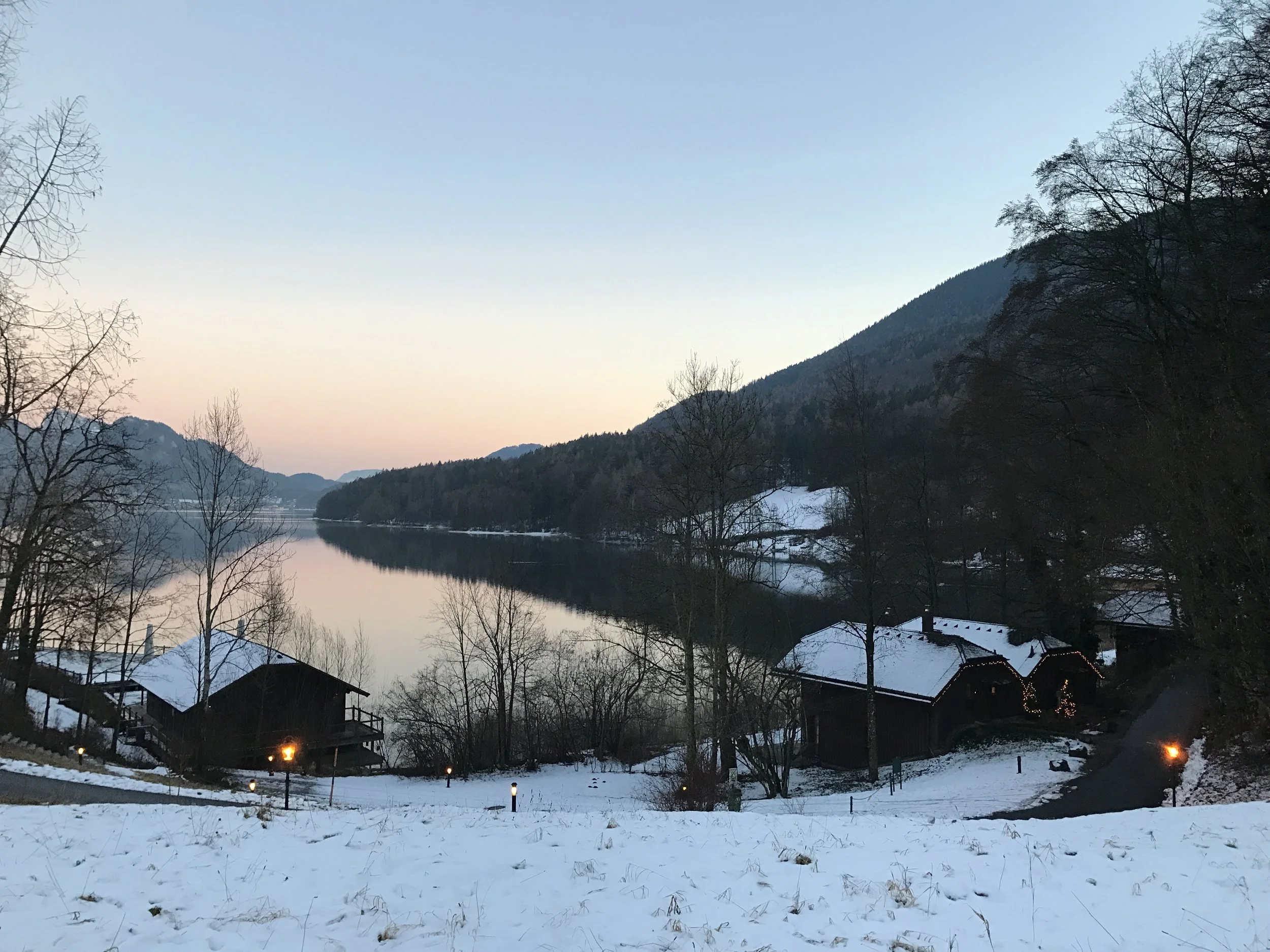 View of the Lake during sunset with snow covered rooftops. Absolutely perfect