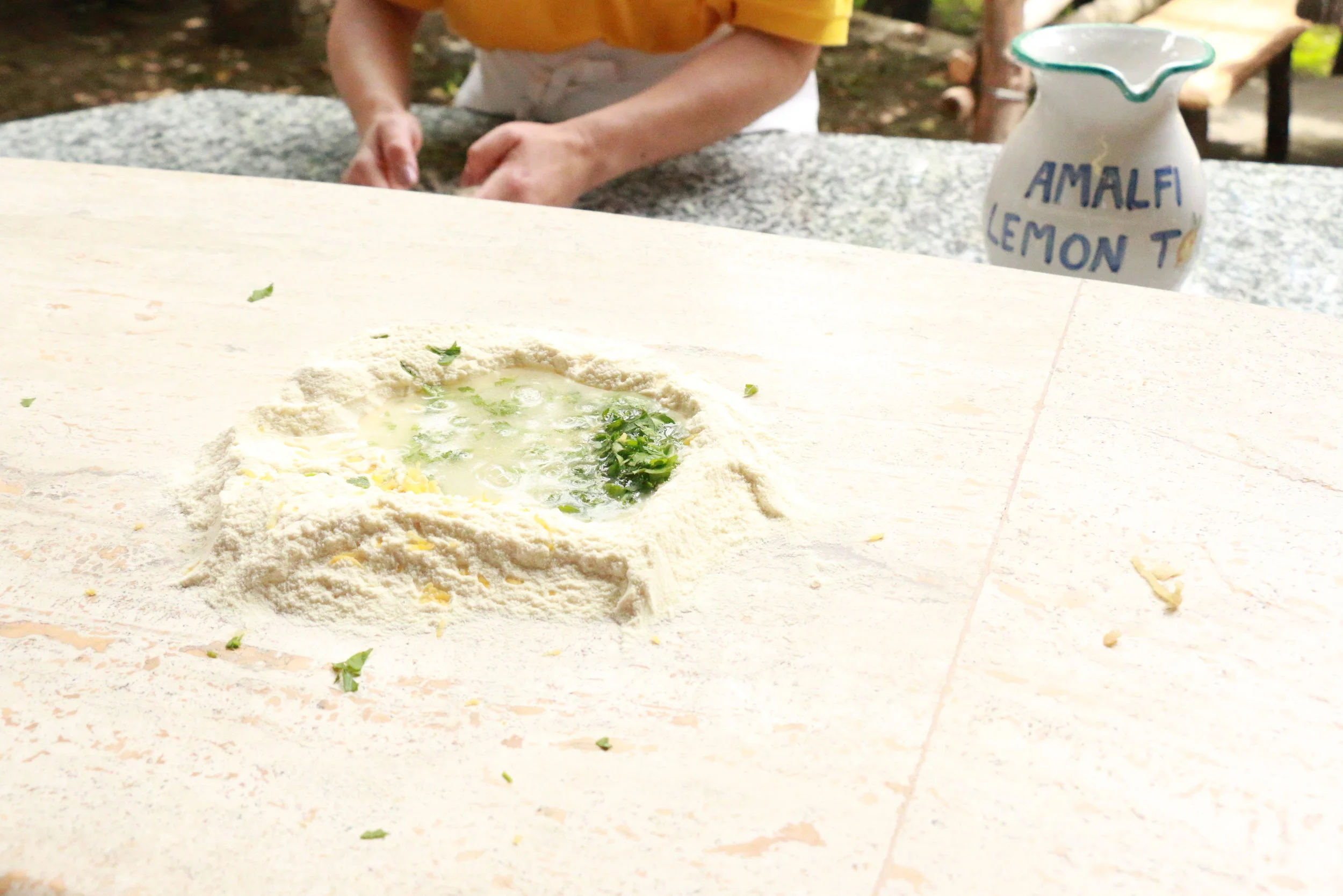 Semolina flour, warm water, fresh chopped herbs, lemon zest, pinch of salt