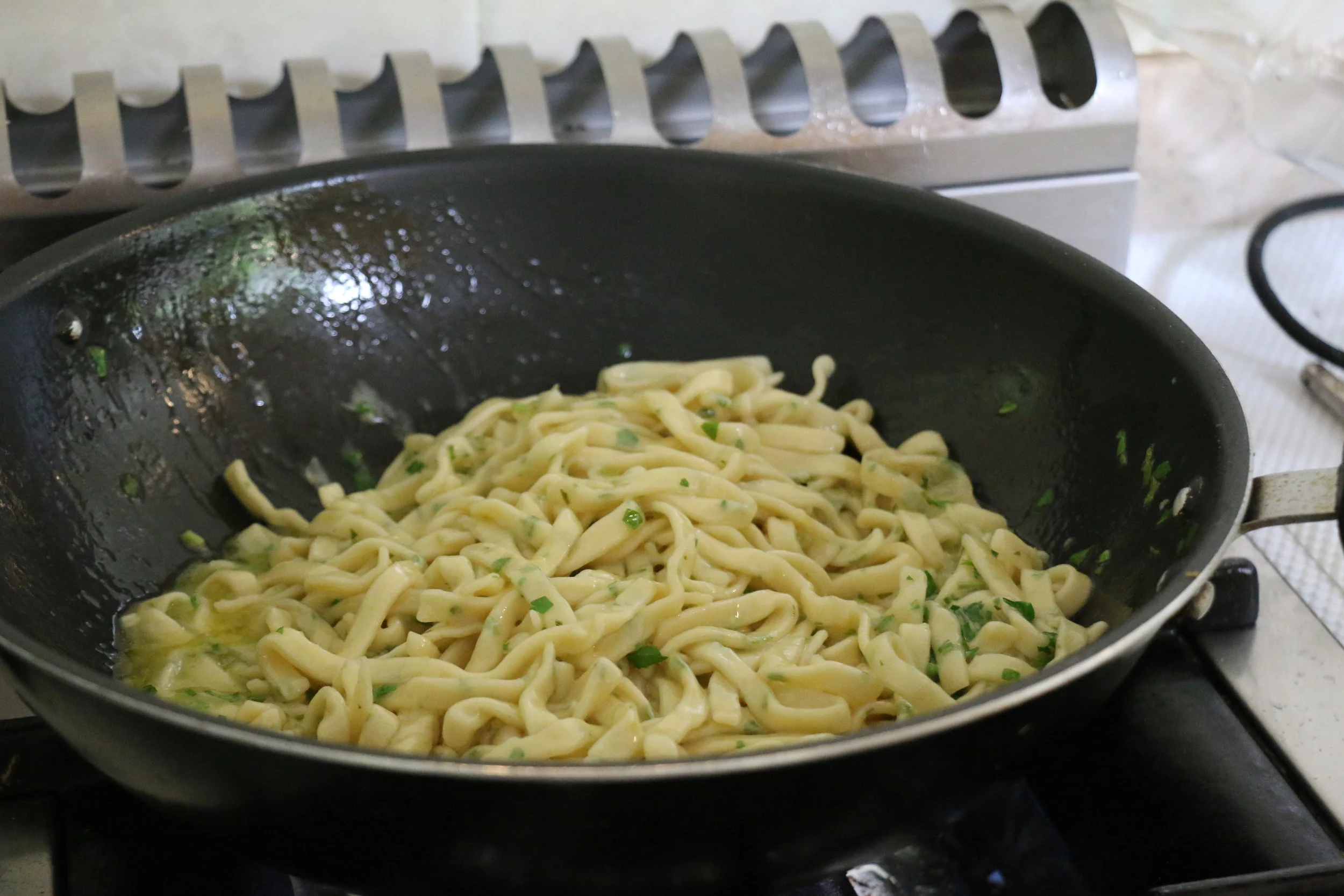 Cook the fresh pasta in some olive oil, garlic, lemon zest, fresh herbs, and of course some fresh Amalfi lemon juice!