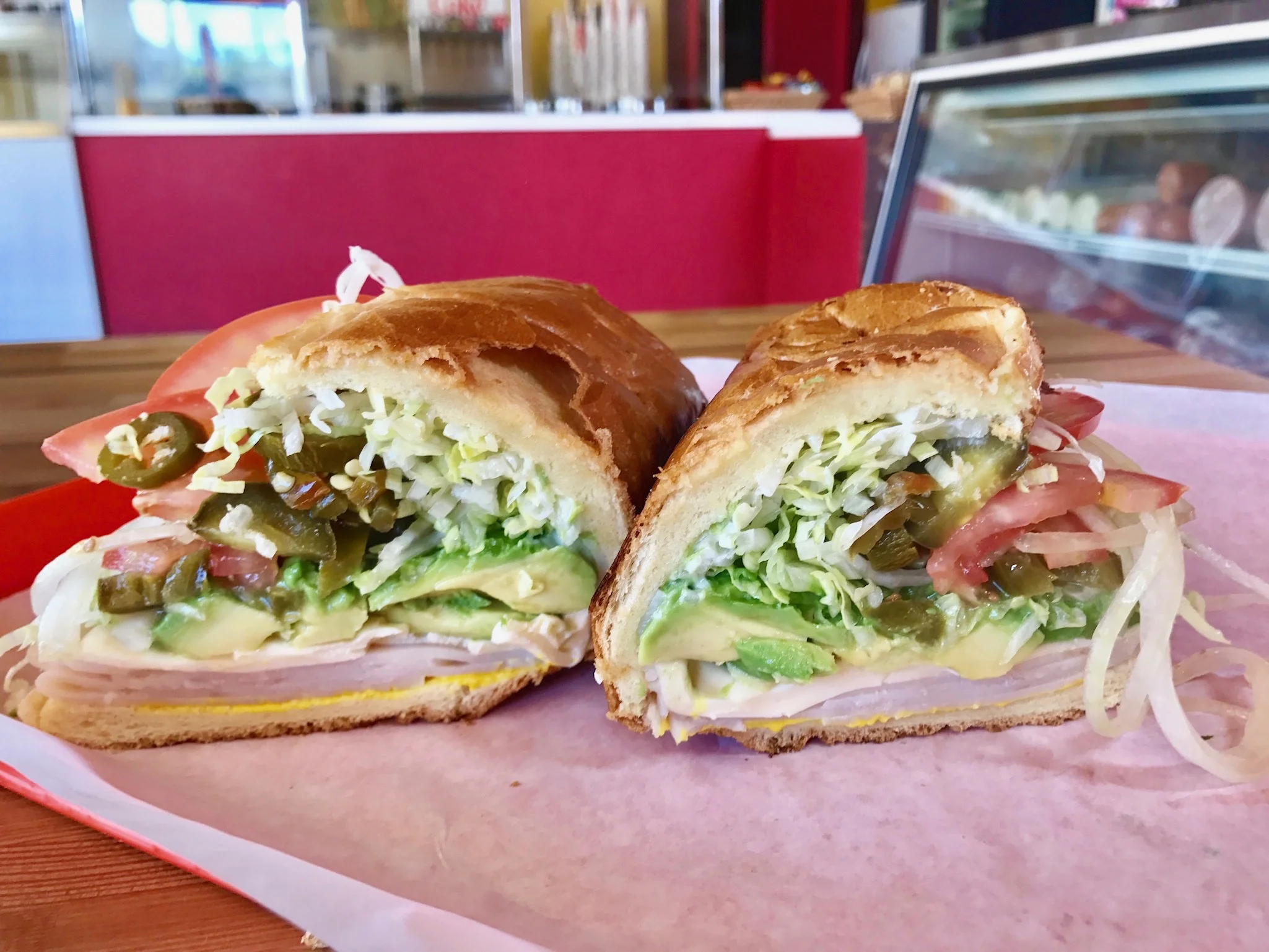 The avocado turkey sandwich will added jalapeno. 
