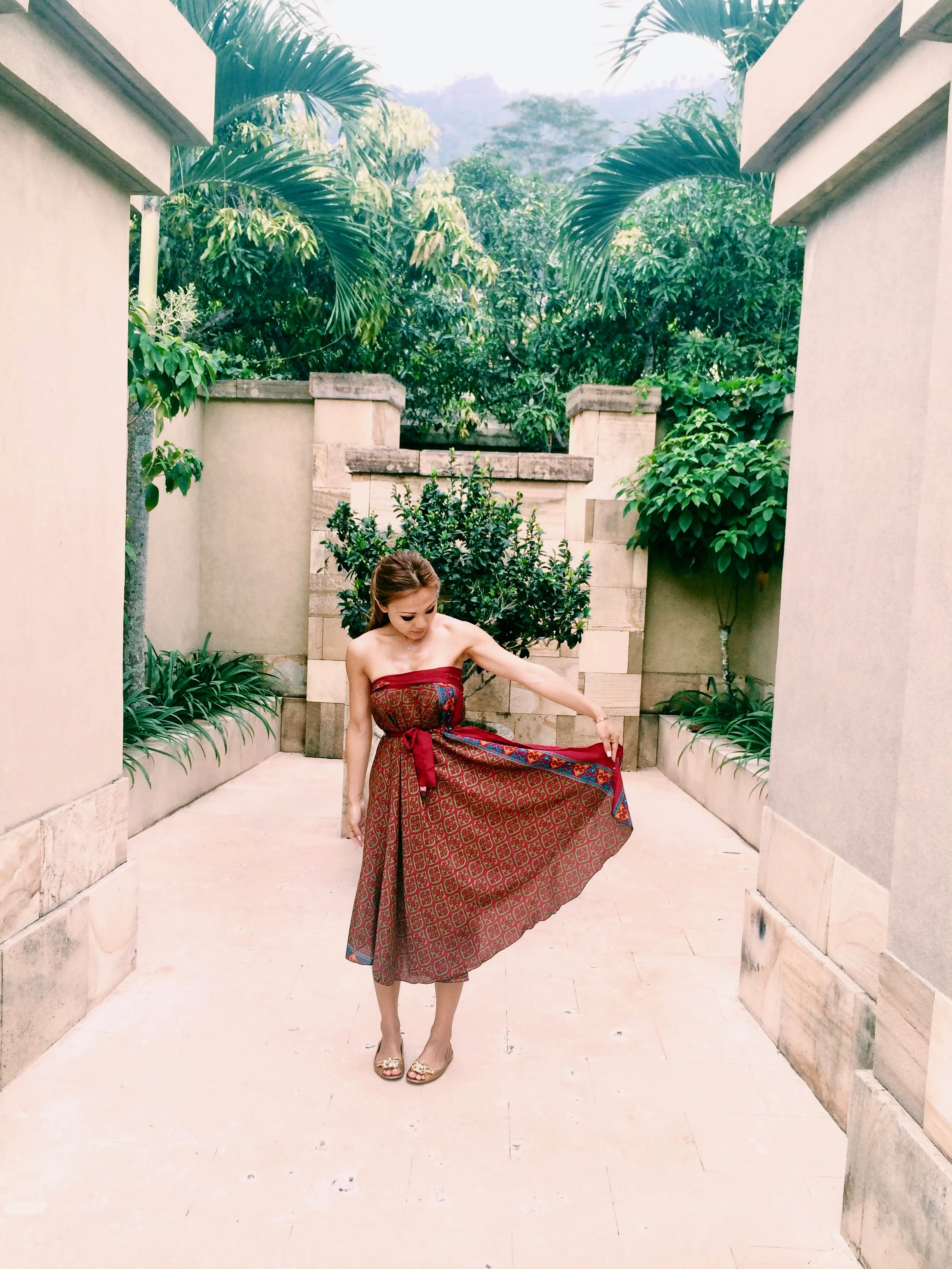 Our personal courtyard/walkway that leads to your bedroom and me sporting a balinese inspired silk wrap worn as a dress. 