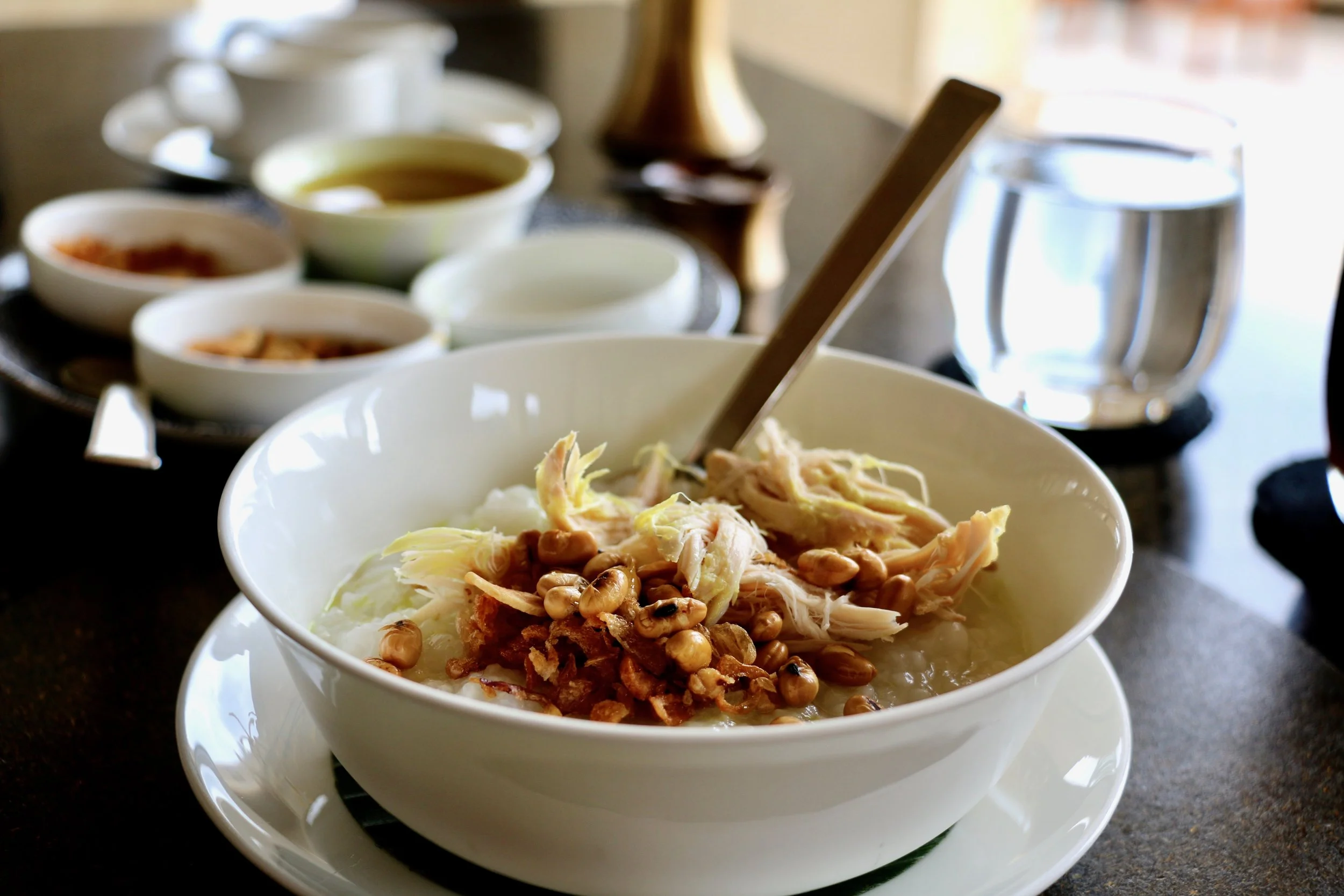 I like to add everything in there! You mix it all up and get this super comforting bowl of congee. Sooooo good.