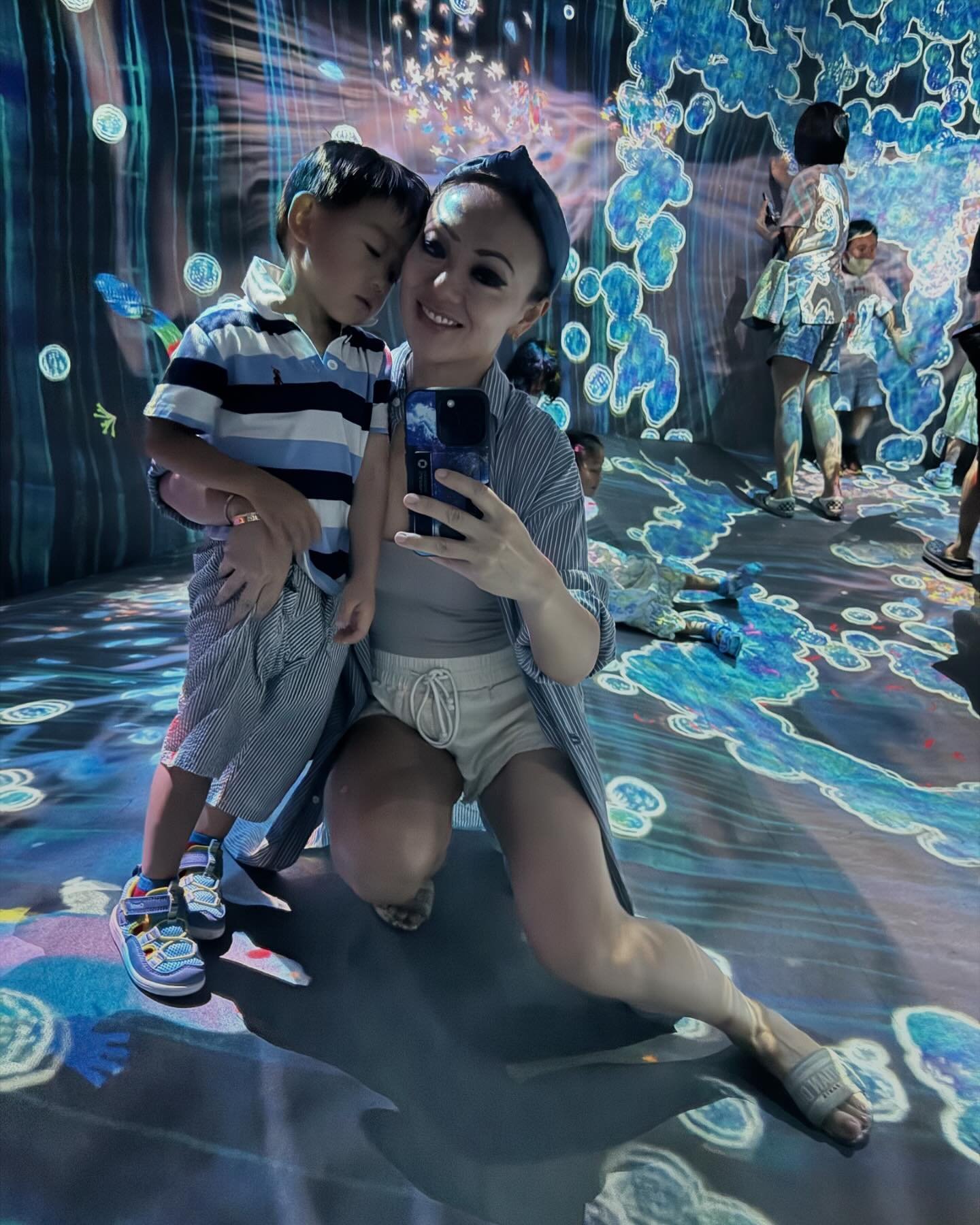 The only photo I could get with one of my kids. #teamlabs #taipei