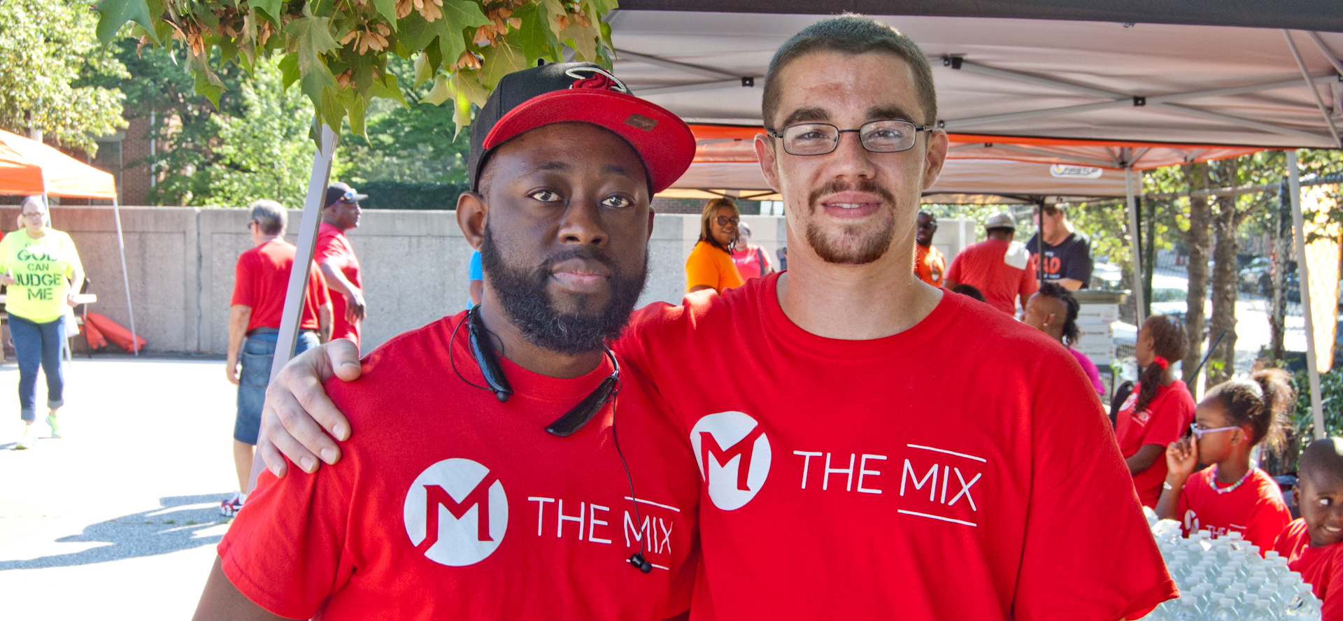"This is community day, getting together and eat some food. A moon bounce for the kids, over two hundred backpacks given to the community, and a mobile van to give out one hundred lunches out to Baltimore. It's a church that is not in the community but out in the community. We're watching the hill, Fed Hill and Butchers Hill. We're giving giving back to the community."