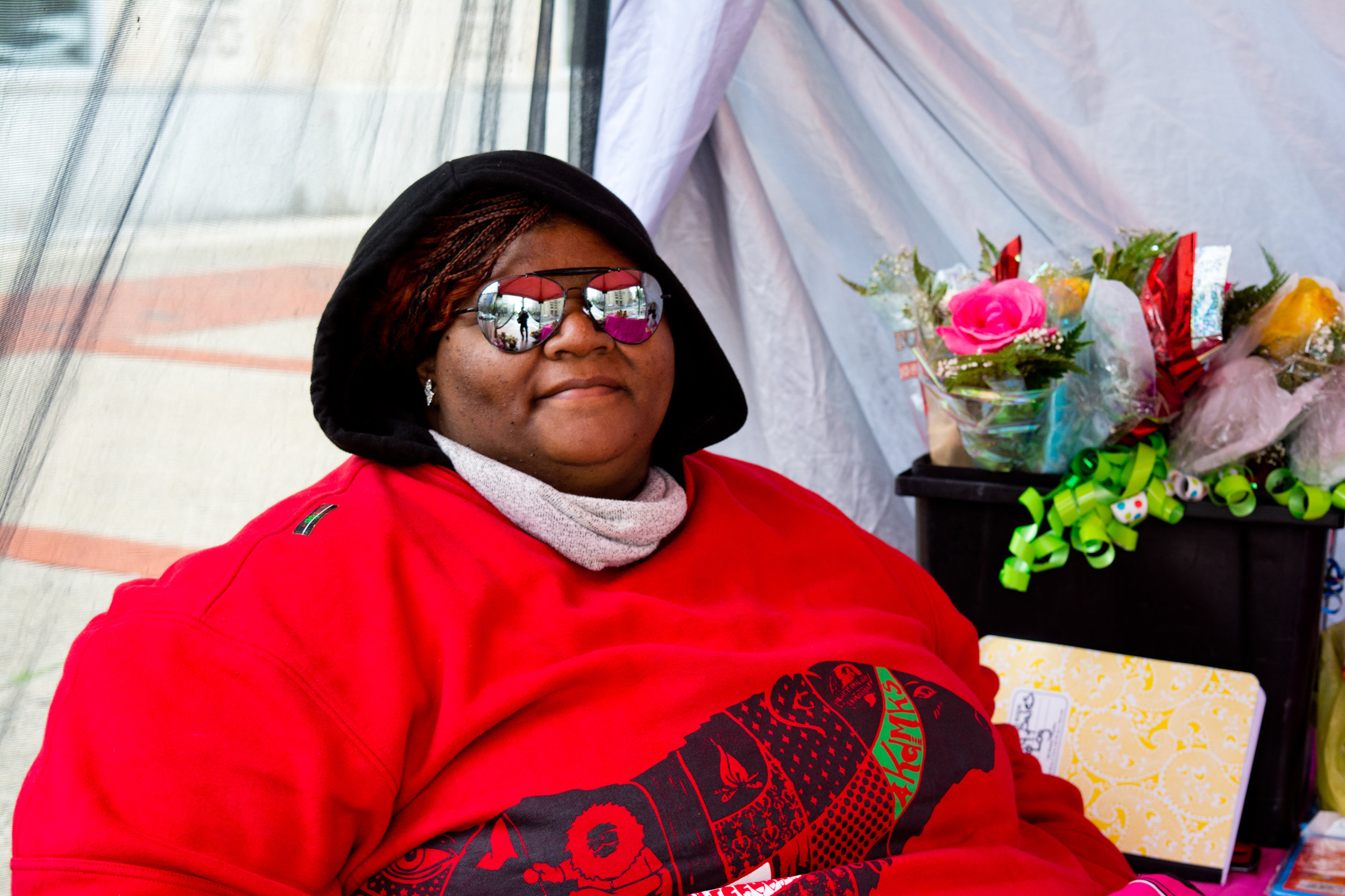 "This is my own business and I've been doing this for about four years give or take. I like being in control of my own income to provide for my family. And Baltimore is a good place, and I think that it gets a bad rap. That's what attracted me when you asked to take my photo. We just need to reach out to each other because we are all humans."
